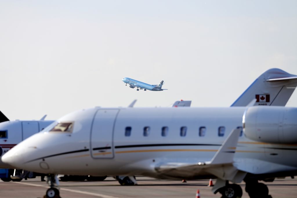 Planes sit on the tarmac at and take off from Schiphol Airport in the Netherlands on Nov. 15, 2022.
