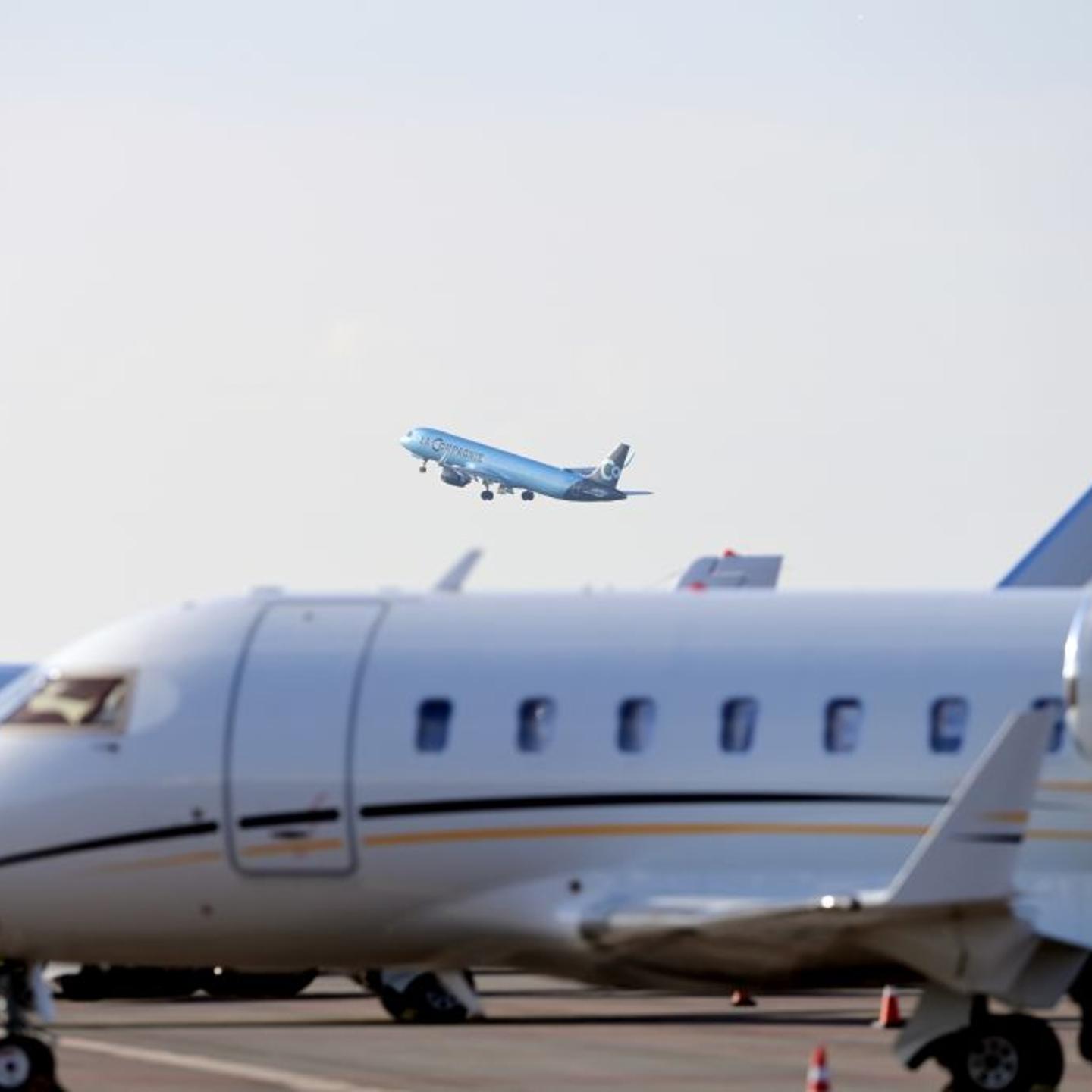 Planes sit on the tarmac at and take off from Schiphol Airport in the Netherlands on Nov. 15, 2022.