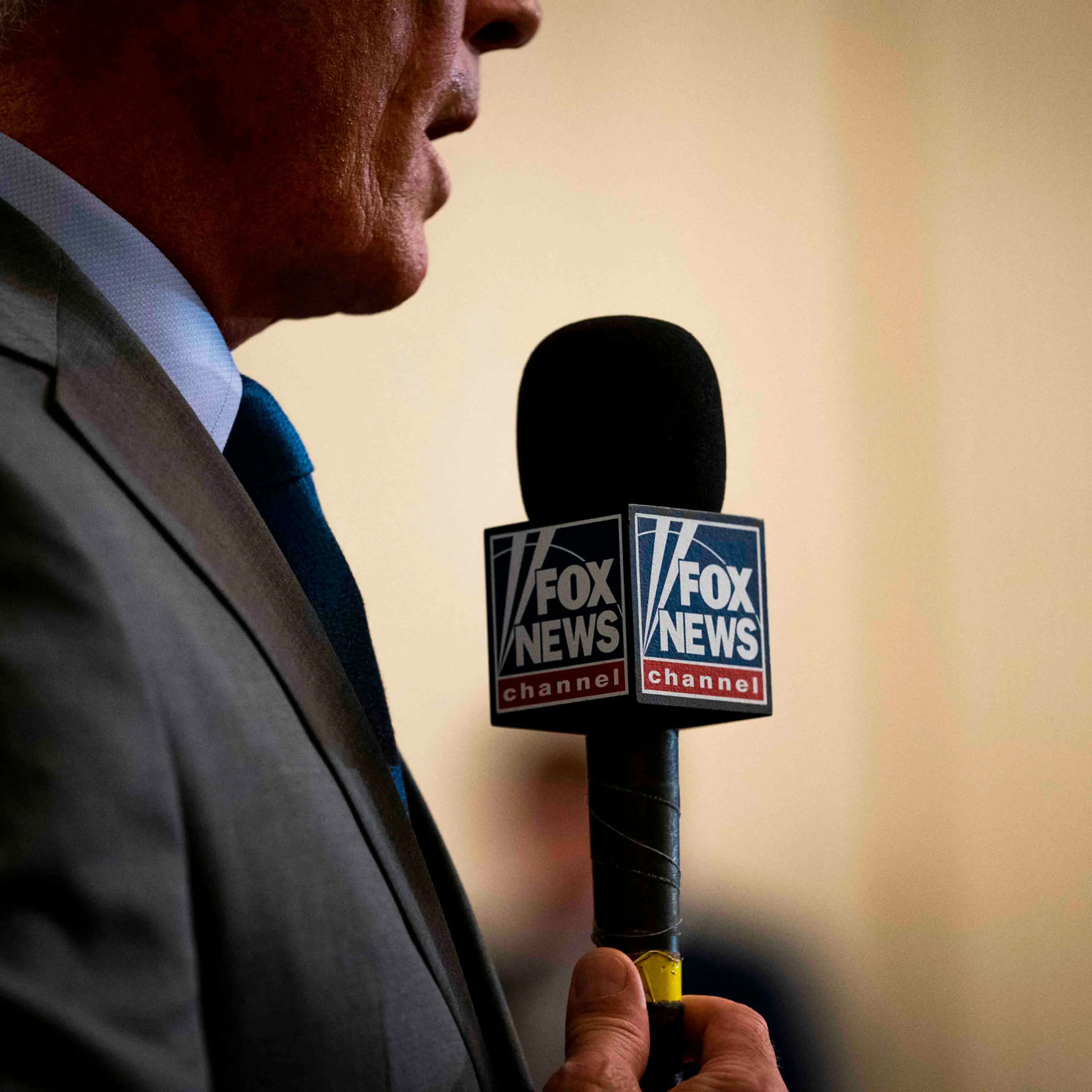 A Fox News reporter during coverage of a news conference at the White House