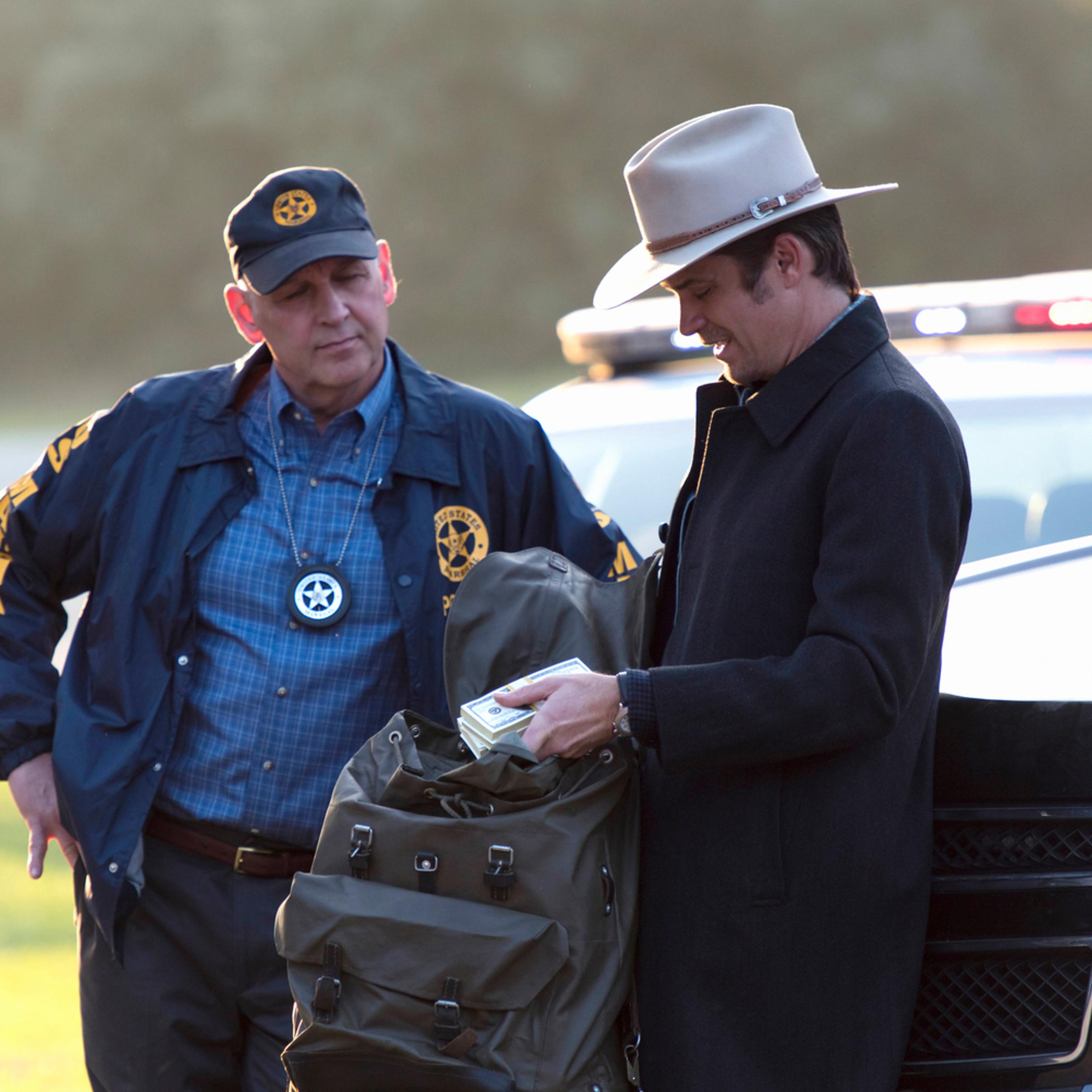 JUSTIFIED -- "Promise" Episode 313 (Airs Tuesday, April 14, 10:00 pm e/p) Pictured (l-r): Nick Searcy as Chief Deputy U.S. Marshal Art Mullen & Timothy Olyphant as Deputy U.S. Marshal Raylan Givens.CR: Prashant Gupta/FX