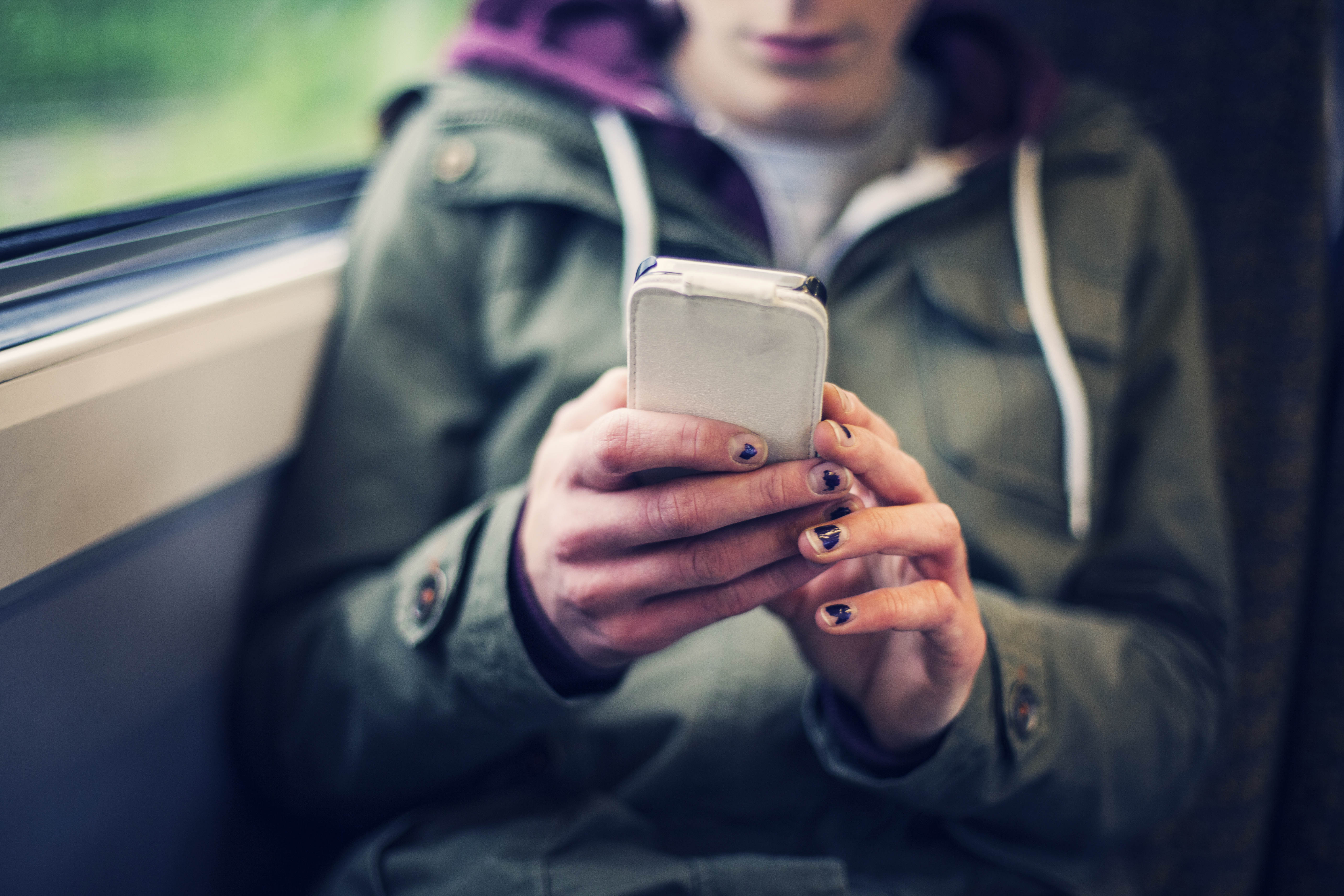 Teenage girl using a smart phone