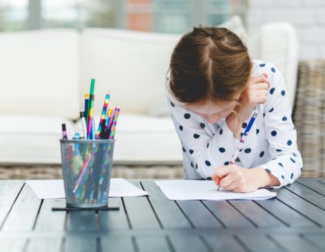 girl-writing-notebook