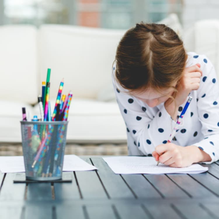 girl-writing-notebook
