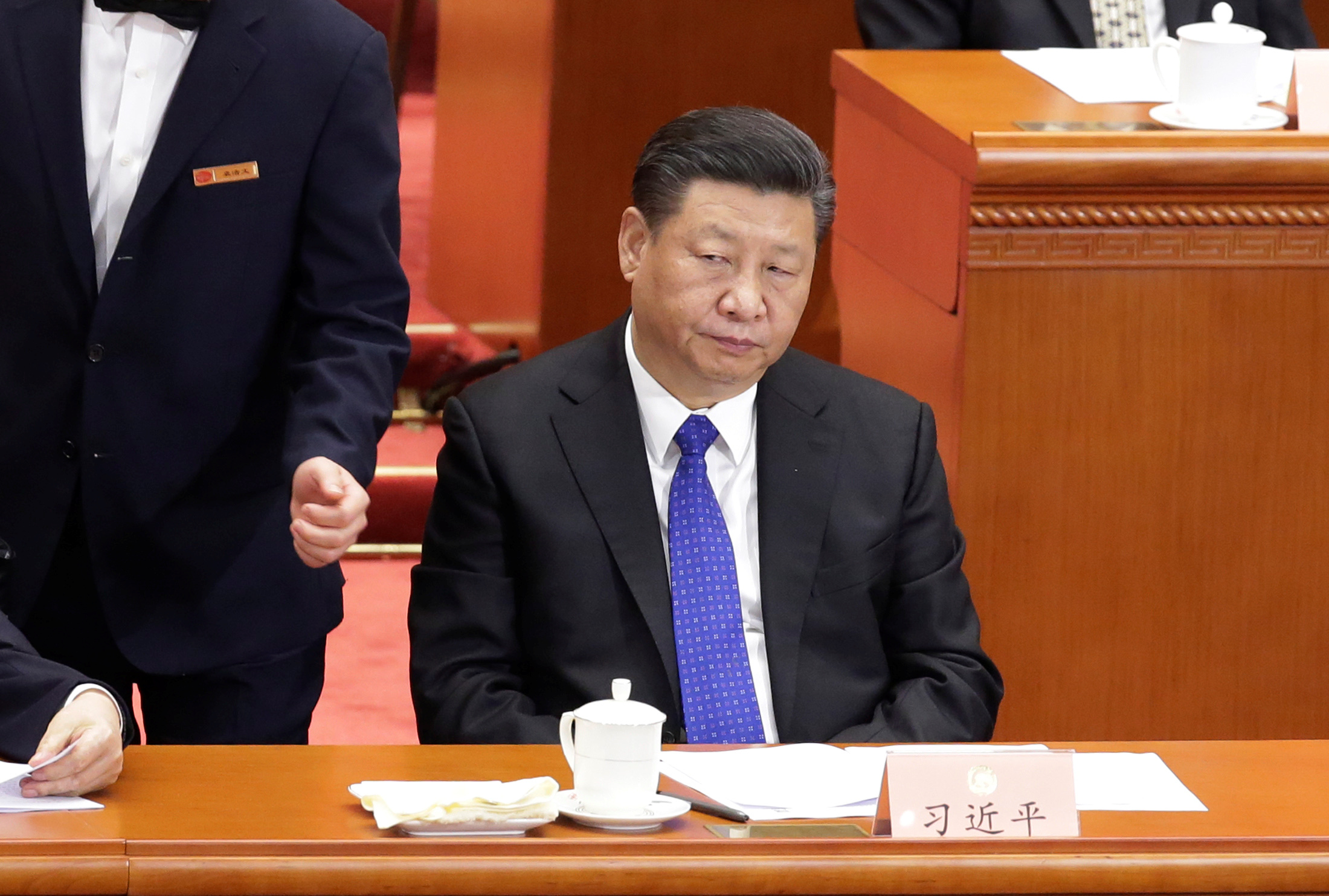 China's President Xi Jinping attends the opening session of the CPPCC in Beijing