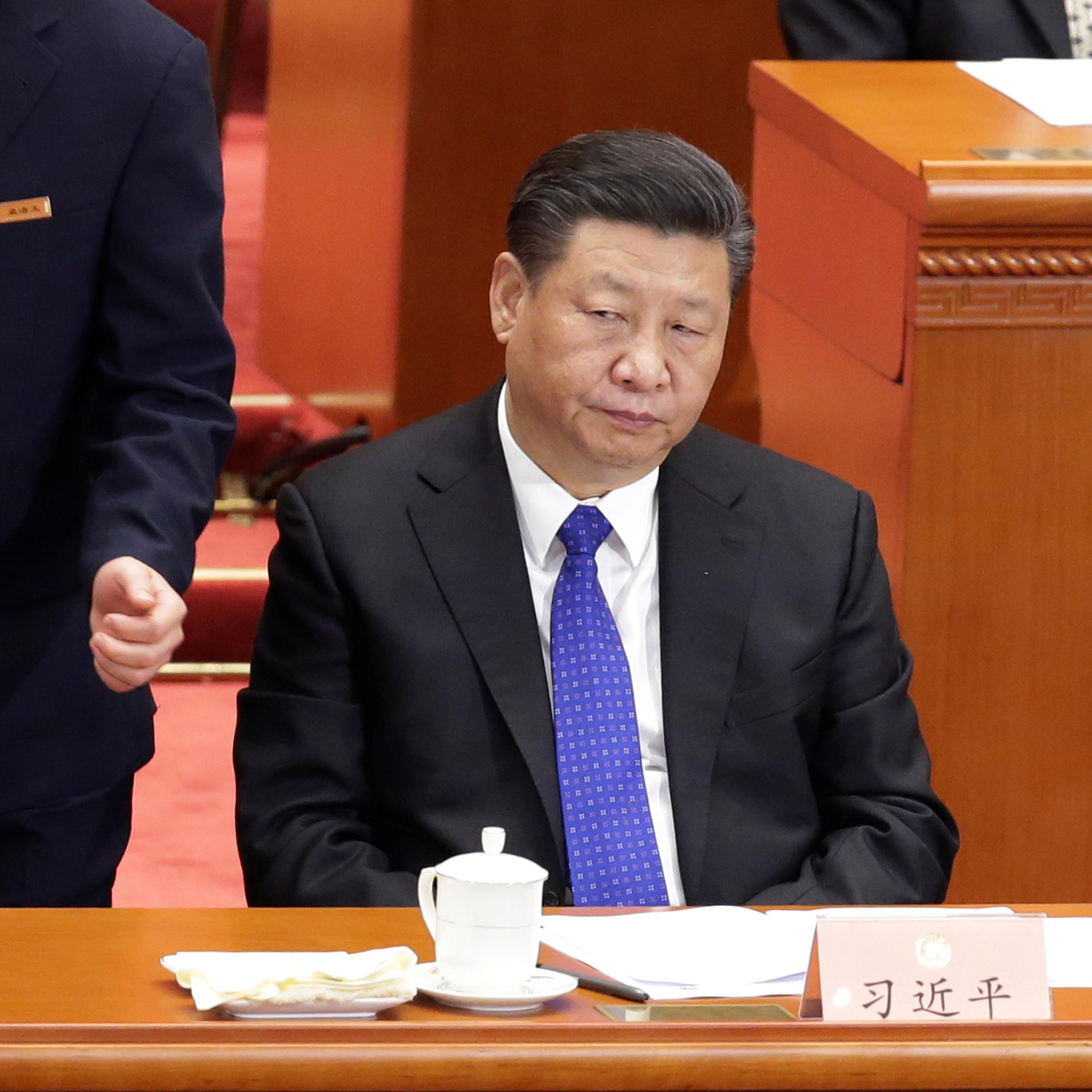 China's President Xi Jinping attends the opening session of the CPPCC in Beijing