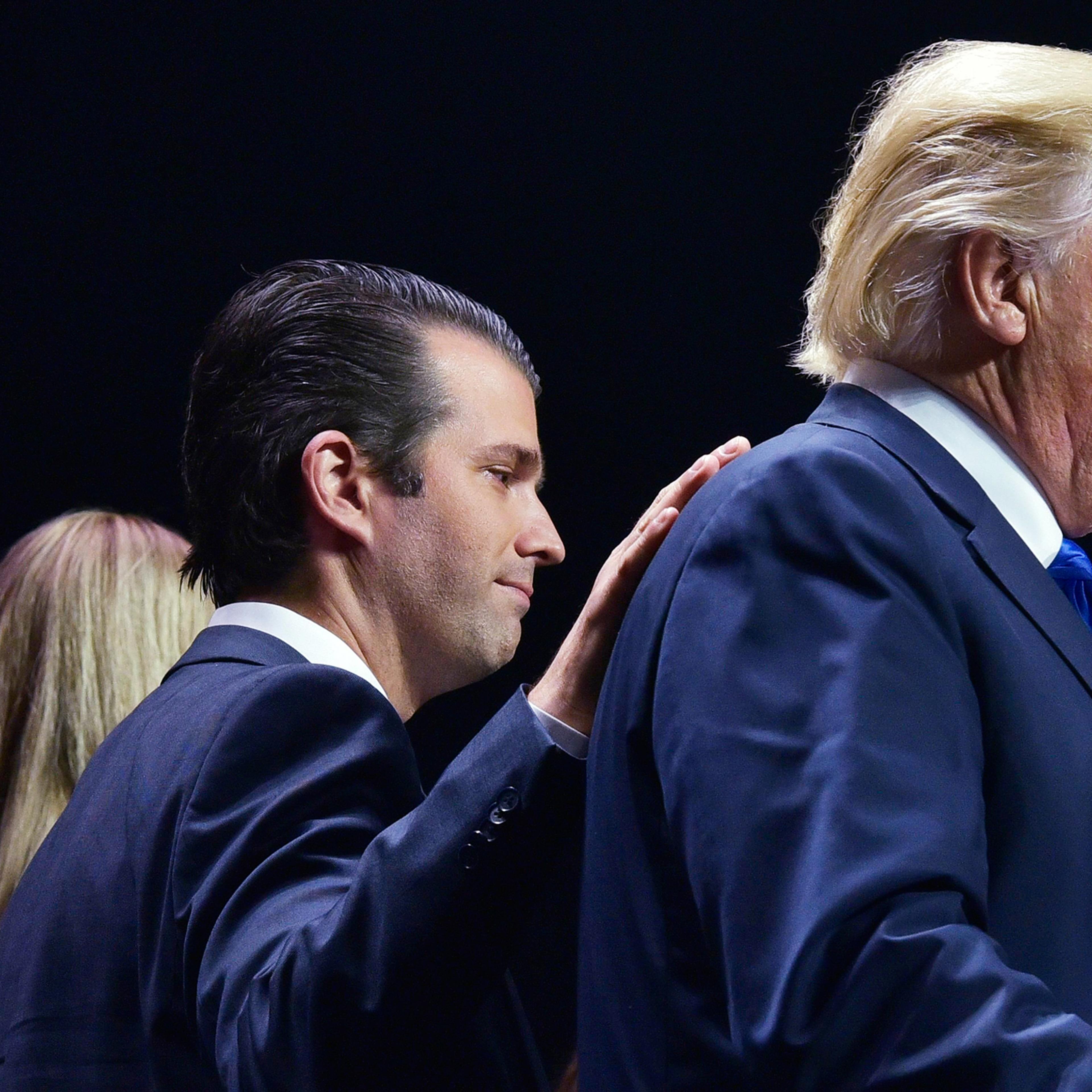 Father and son attend a rally in Manchester, N.H., on Nov. 7, 2016, the eve of the election.