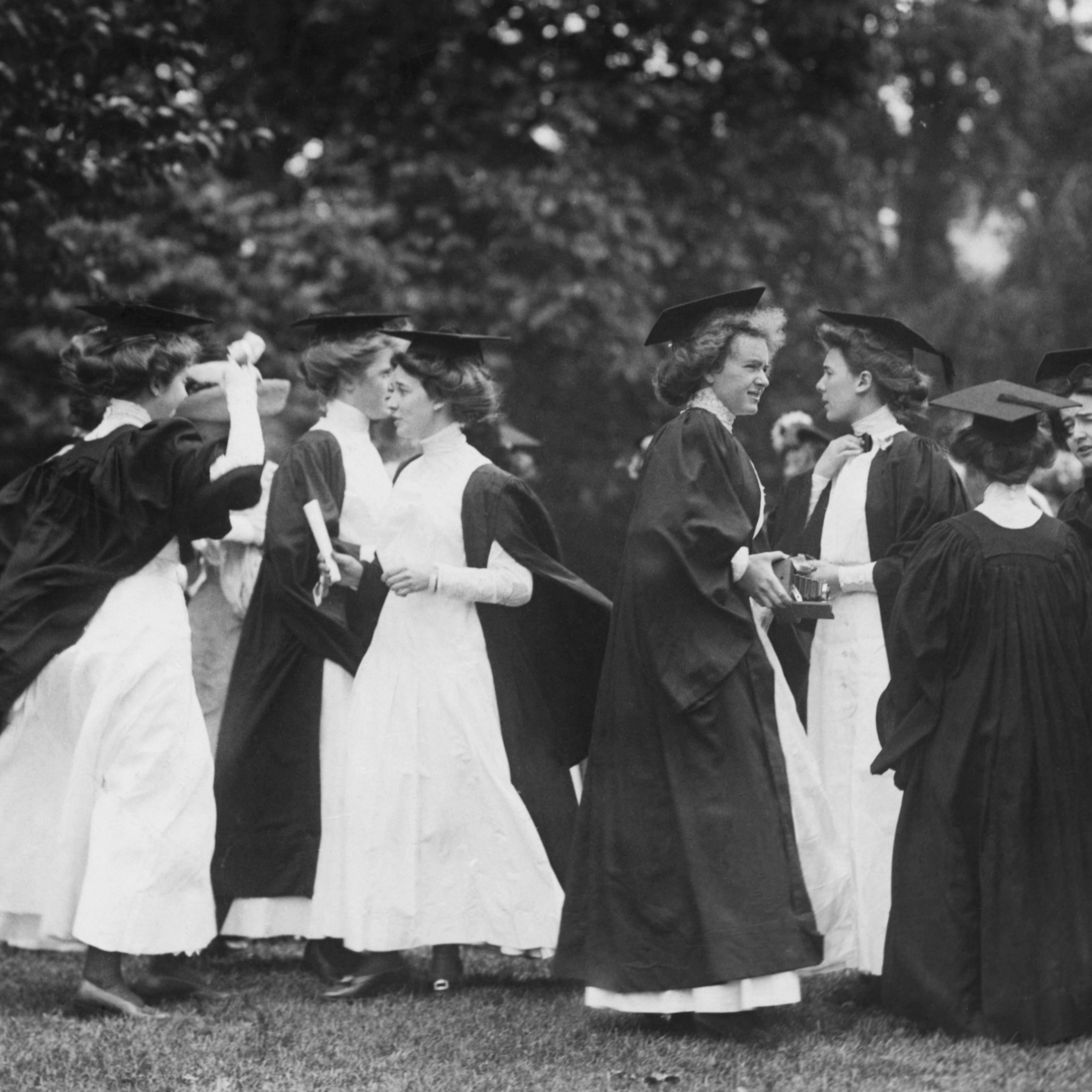 Women Graduates Exiting After Ceremony