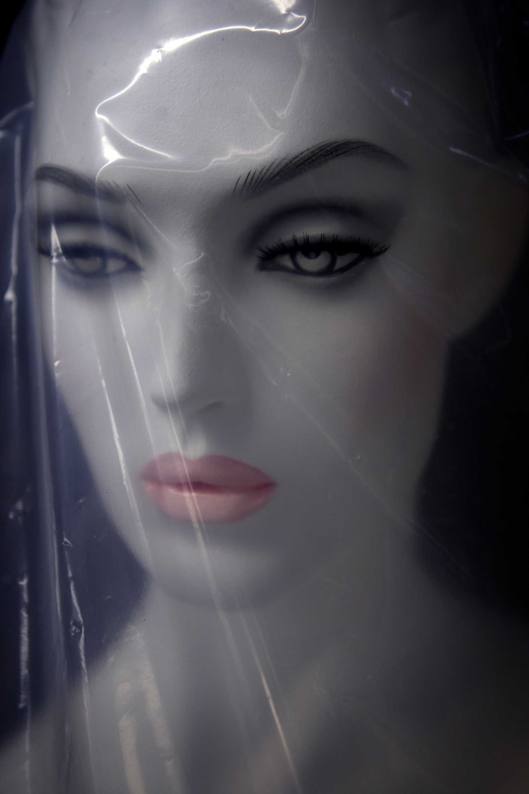 A female mannequin is covered with plastic bag just before being shipped at the Goldsmith factory in New York Tuesday, Sept. 4, 2007. As Fashion Week gets underway in New York, rail thin models will still be on the runways, but when garments reach the st
