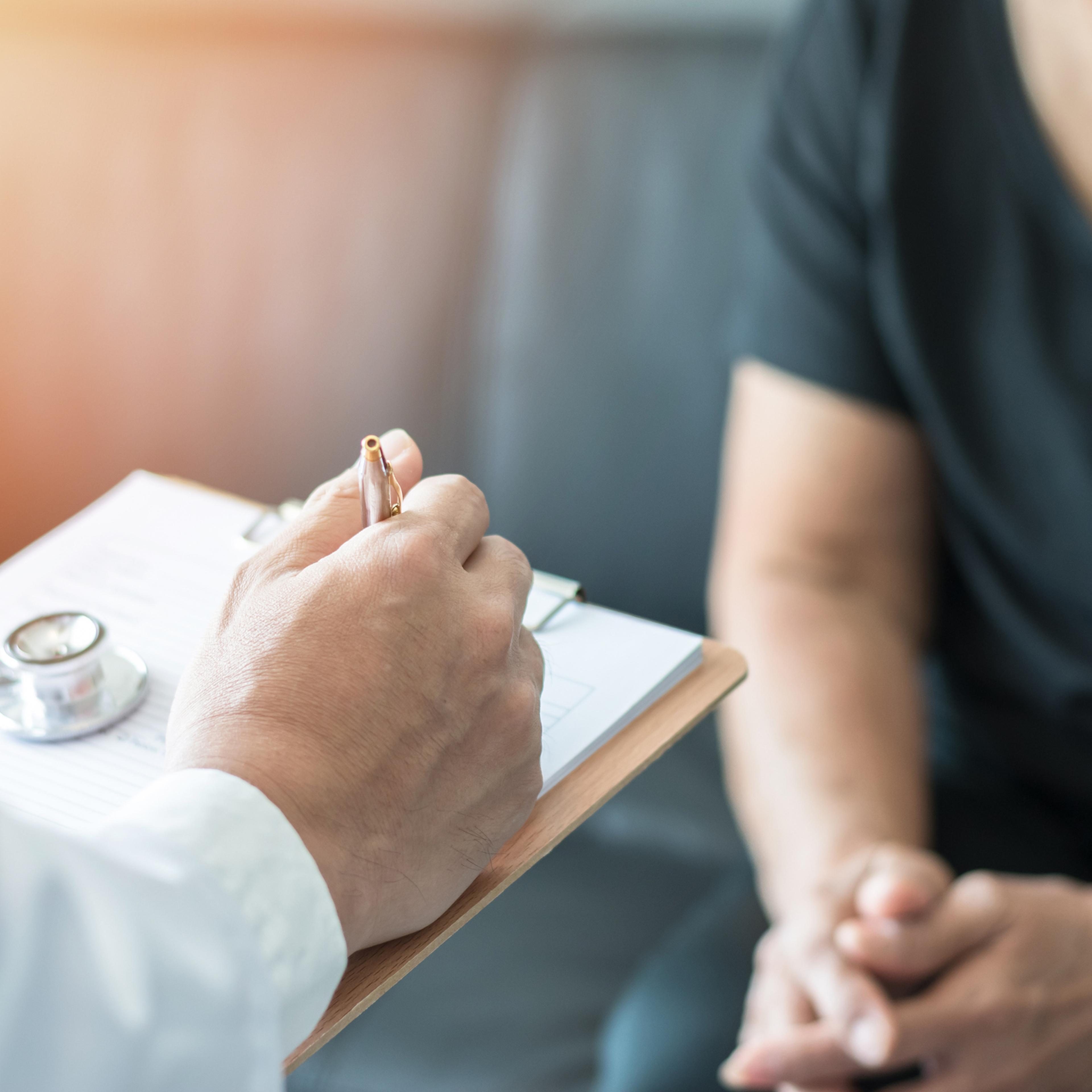 Geriatric doctor giving cognitive assessment