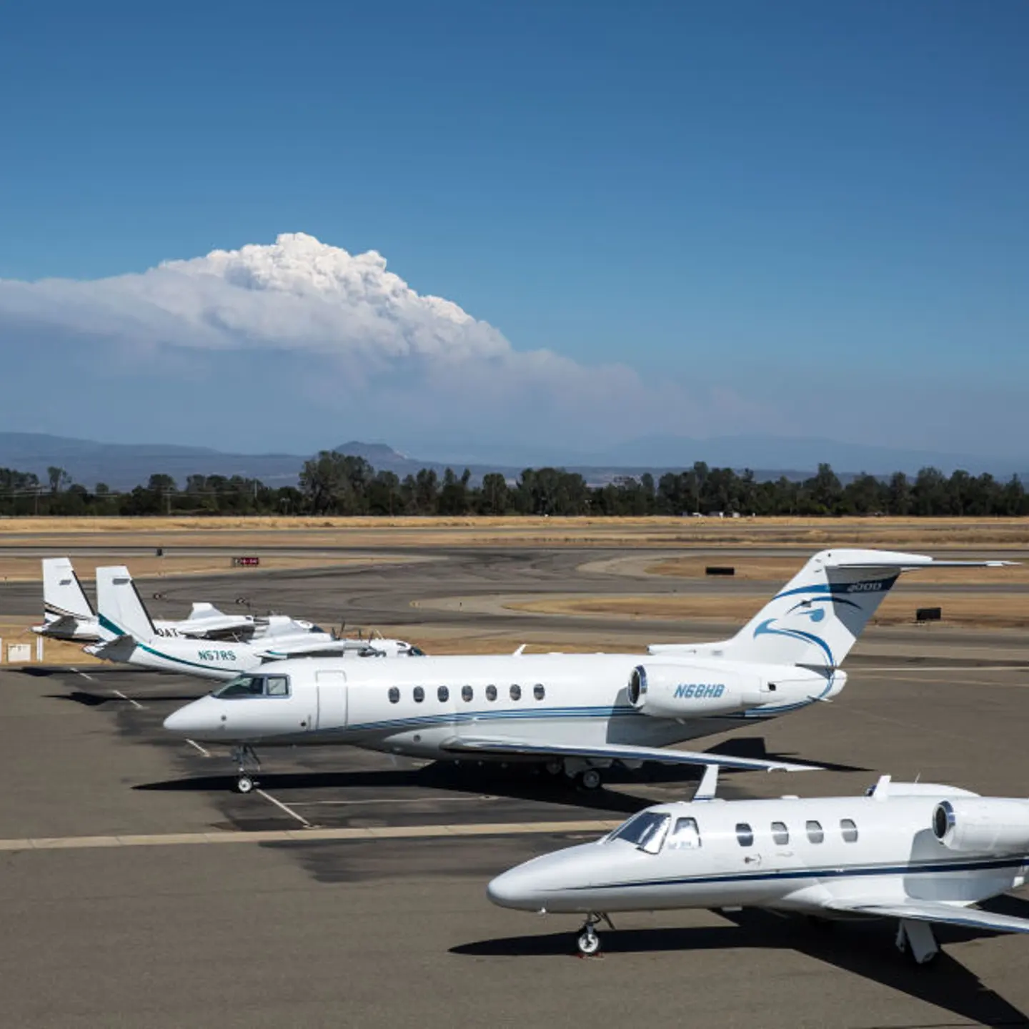 The destructive Dixie Fire can be seen from the airport on August 4, 2021, in Redding, California.