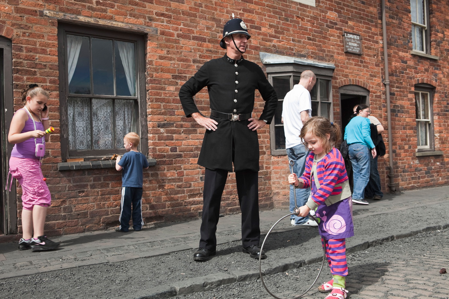 Dudley, The Black Country, England. An area in the midlands, The Black Country gained its name in the mid 19th century due to the smoke from the many thousands of ironworking foundries and forges. Street games at the Black Country Living Museum. 2011.