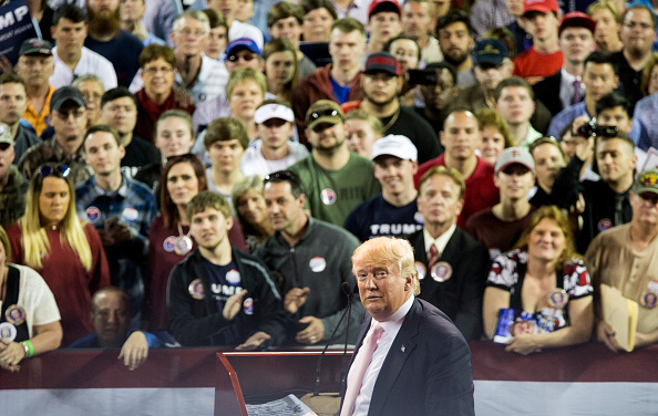 Republican presidential candidate Donald Trump reacts to supporters during a rally at Valdosta State University February 29, 2016 in Valdosta, Georgia.