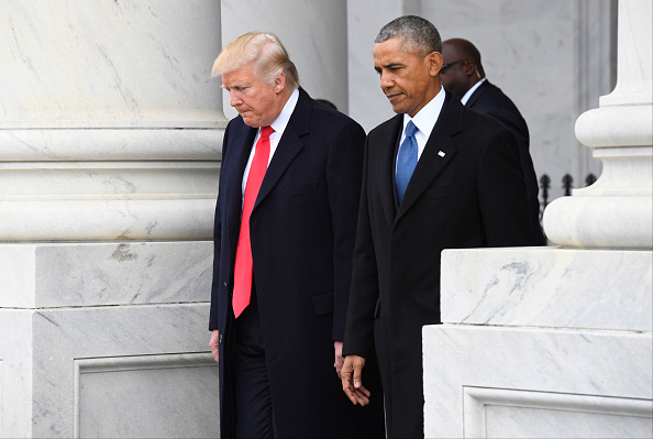 President Donald Trump and former President Barack Obama walk out prior to Obama's departure during the 2017 presidential inauguration at the U.S. Capitol January 20, 2017 in Washington, DC.