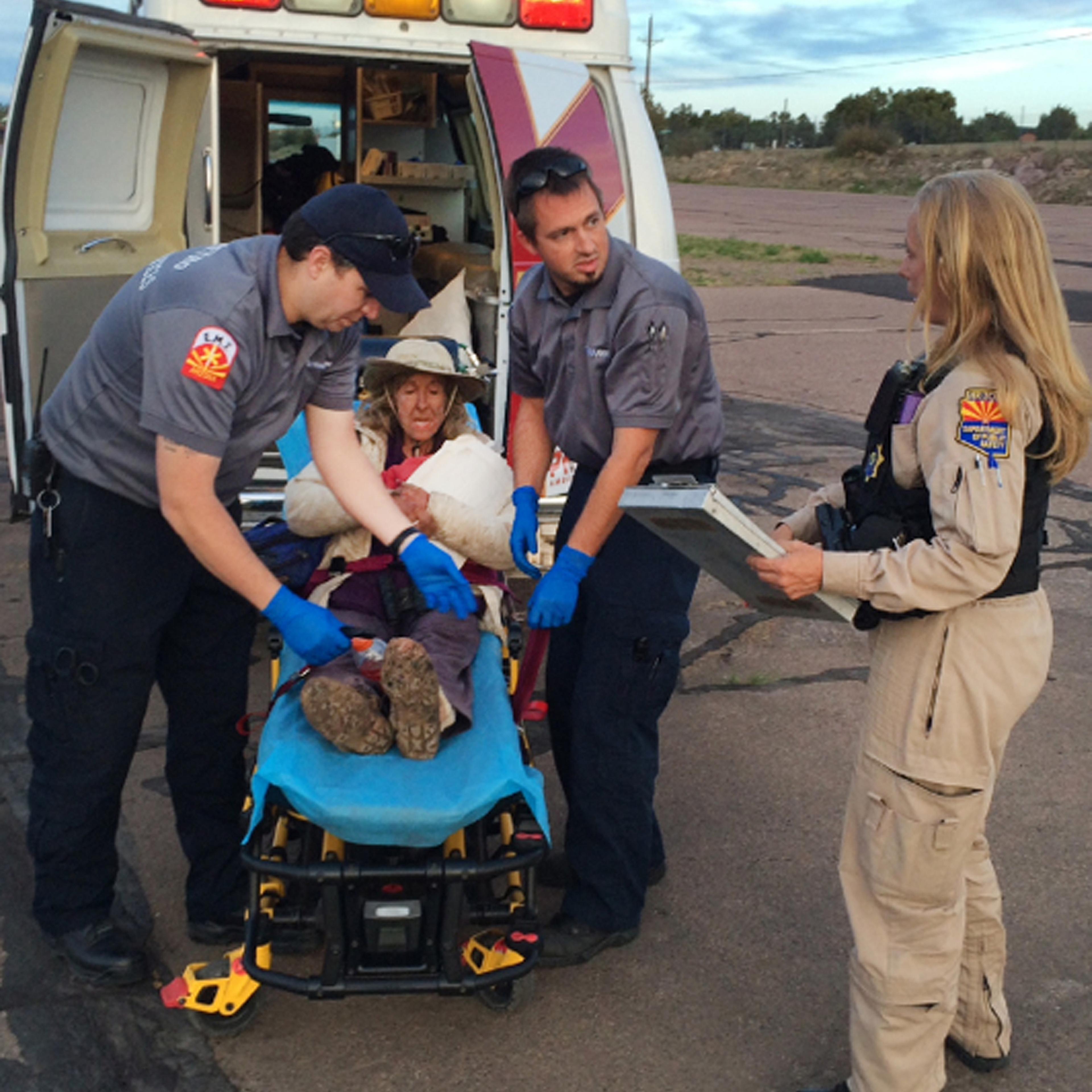 This photo provided by Arizona Department of Public Safety shows an ambulance taking Ann Rodgers, 72 , to safety on April 9, 2016 after she was lost in the forest for nine days.