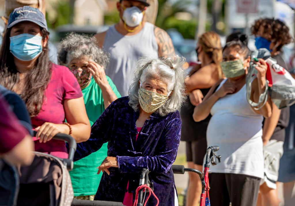 People line up to receive free food in Anaheim, Calif. in July, 2020.