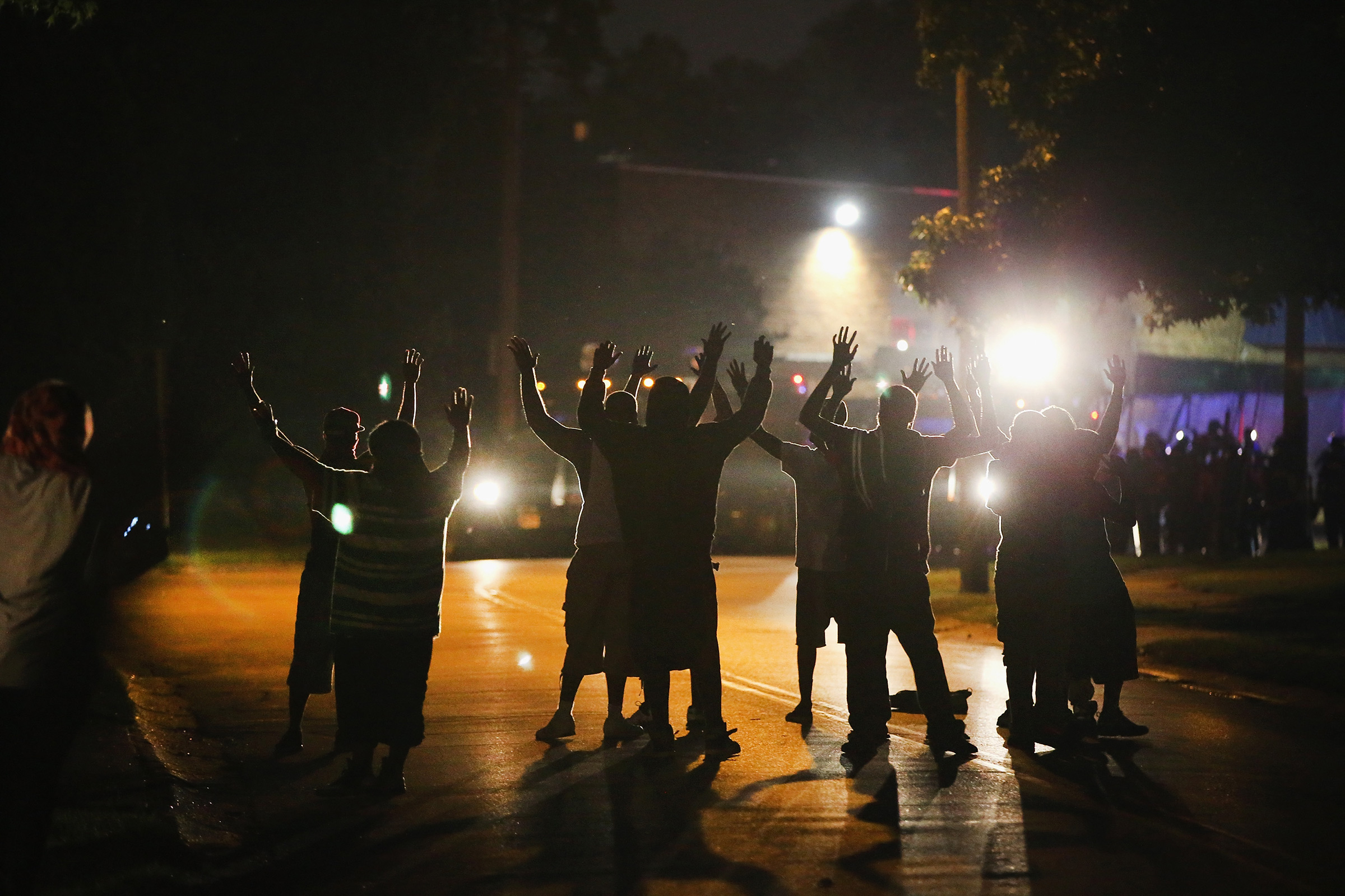 Police lock down a neighborhood in Ferguson amid protests in August 2014.
