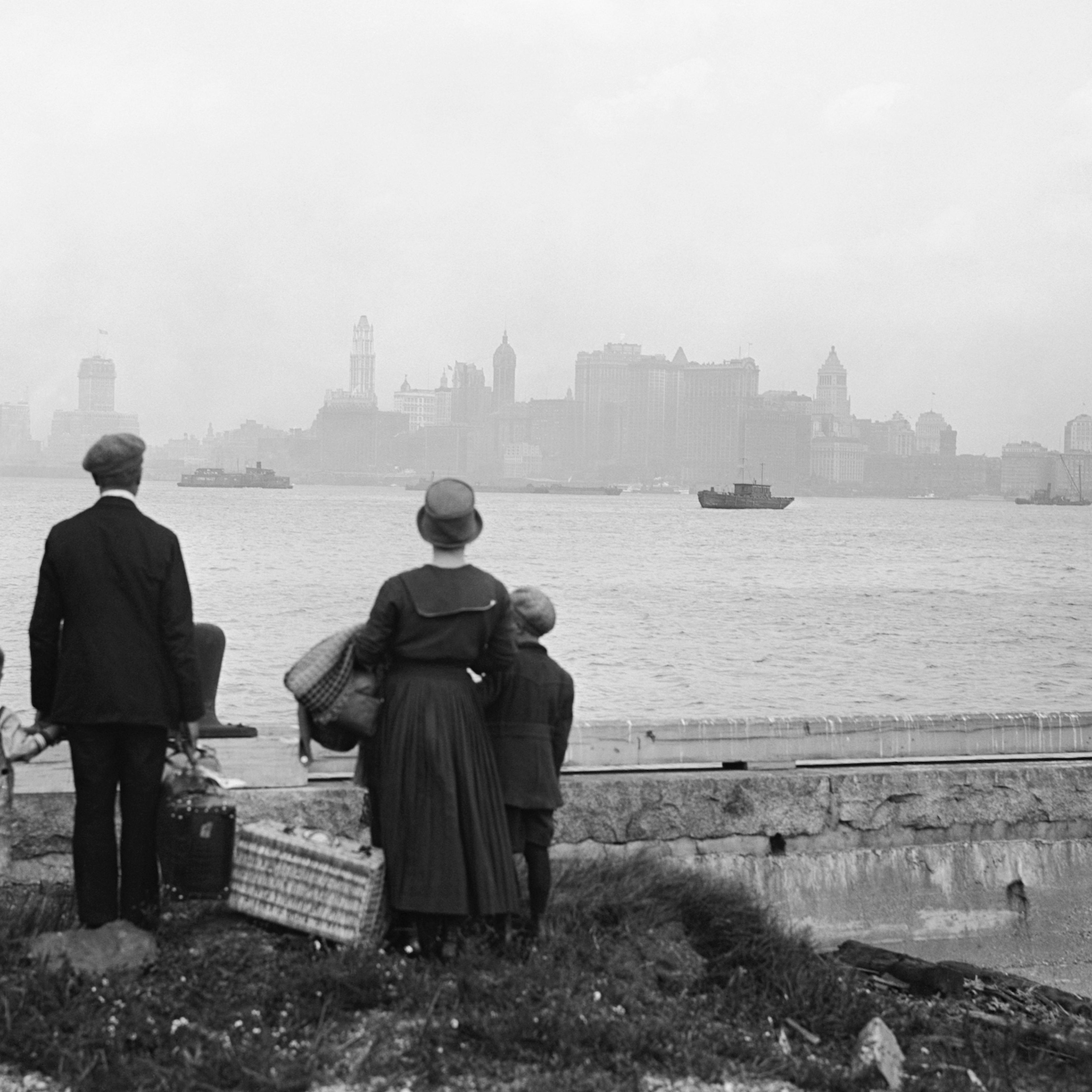 Immigrant Family Looking at New York Skyline