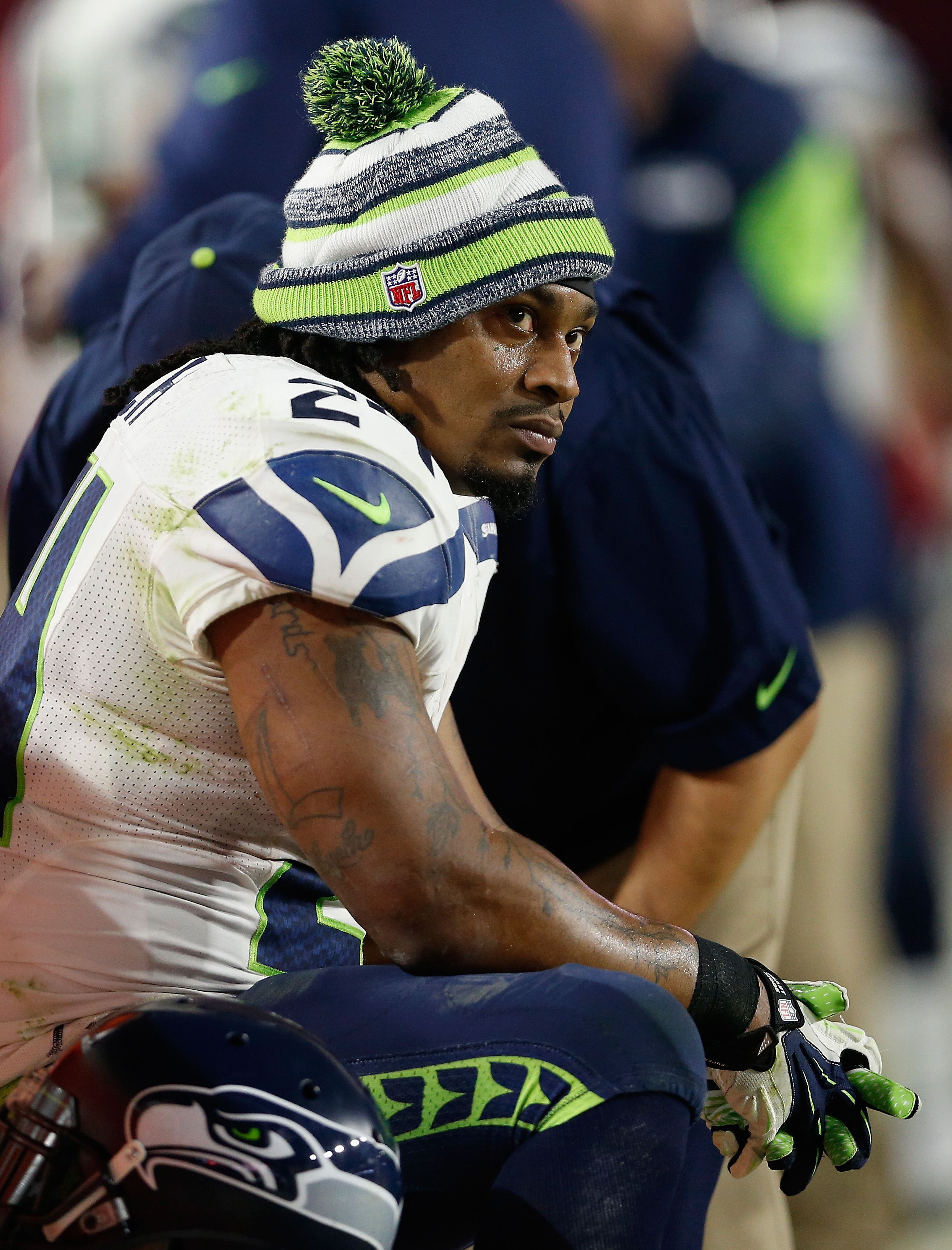Running back Marshawn Lynch of the Seattle Seahawks on the sidelines during the NFL game against the Arizona Cardinals at the University of Phoenix Stadium on Dec. 21, 2014 in Glendale, Ariz.