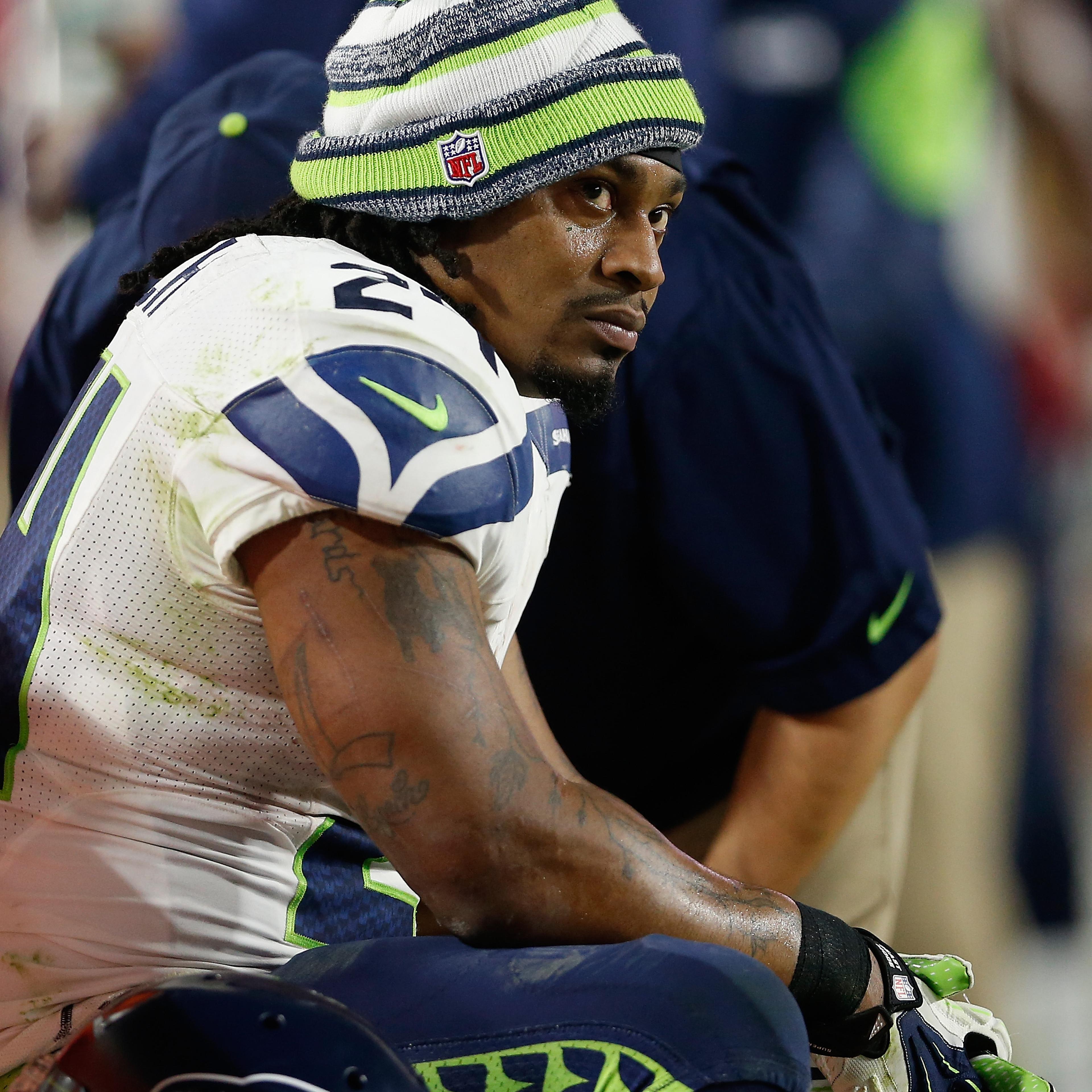 Running back Marshawn Lynch of the Seattle Seahawks on the sidelines during the NFL game against the Arizona Cardinals at the University of Phoenix Stadium on Dec. 21, 2014 in Glendale, Ariz.