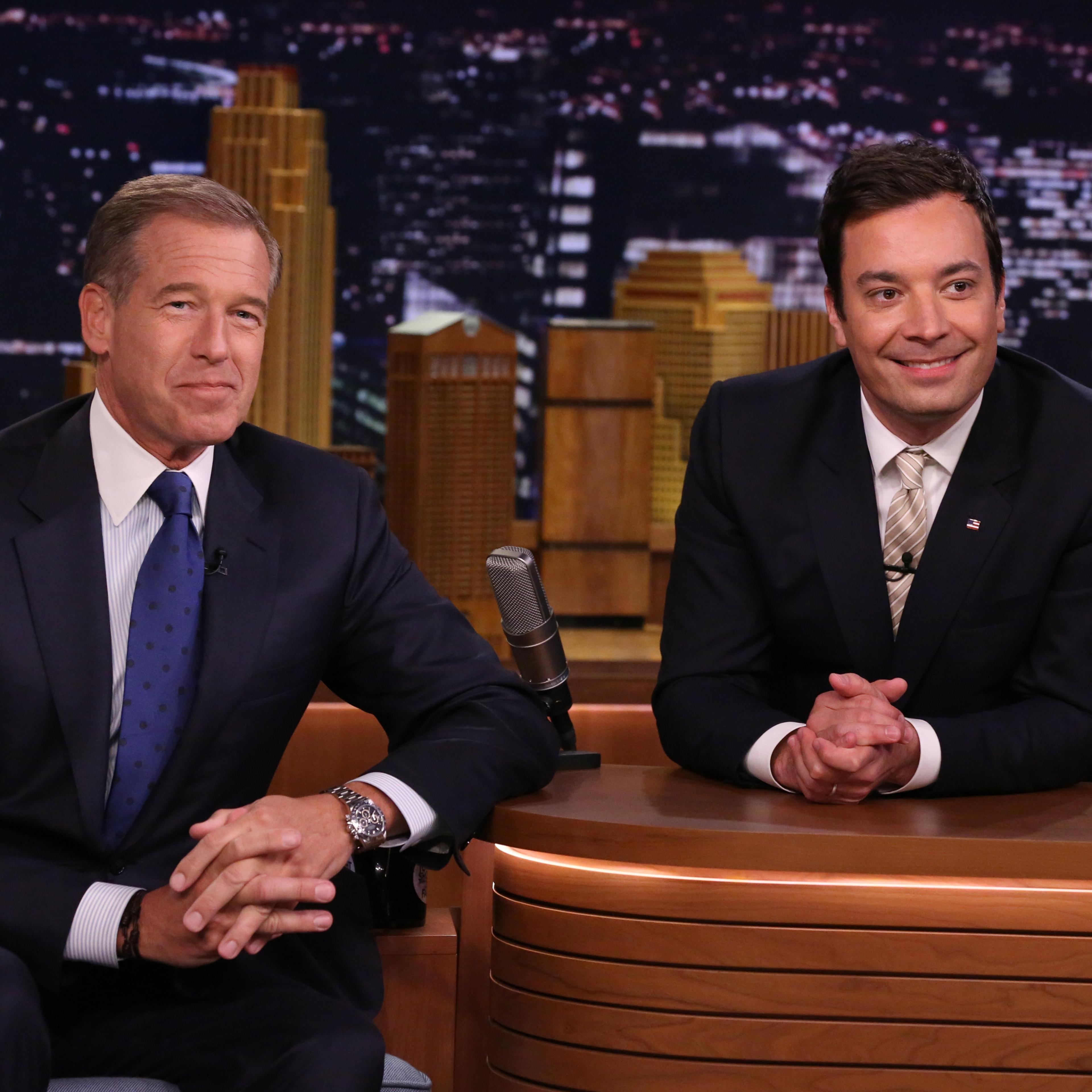 From left: News anchor Brian Williams during an interview with host Jimmy Fallon on April 21, 2014.