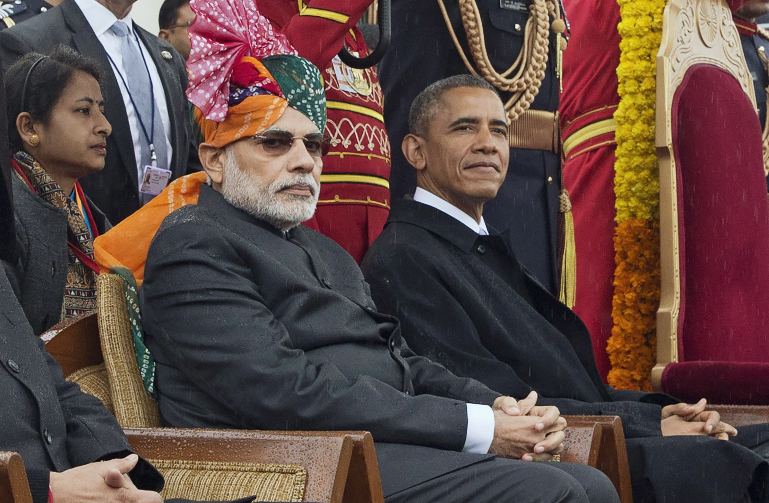 President Barack Obama and Indian Prime Minister Narendra Modi watch a parade and award ceremony during India's Republic Day celebration in New Delhi.