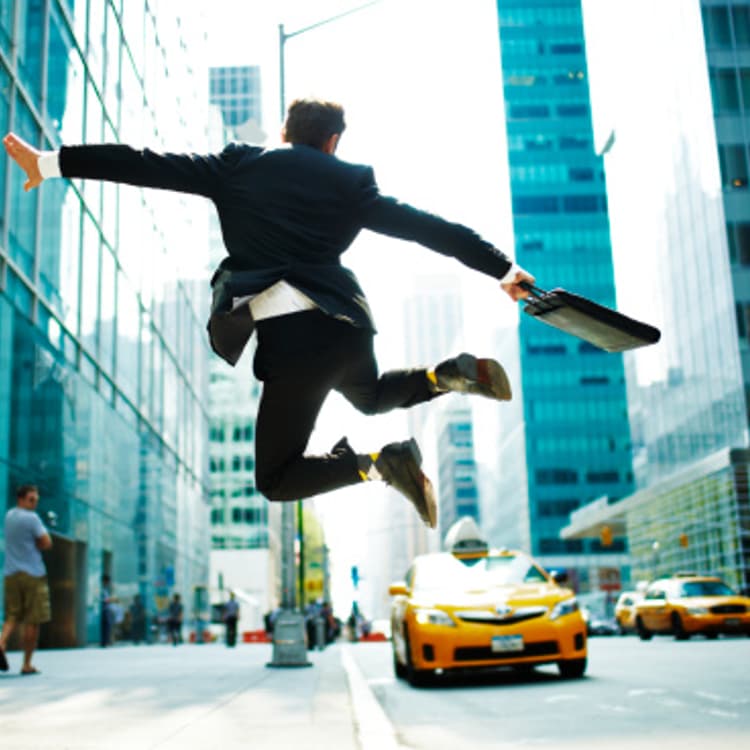 businessman-jumping-street