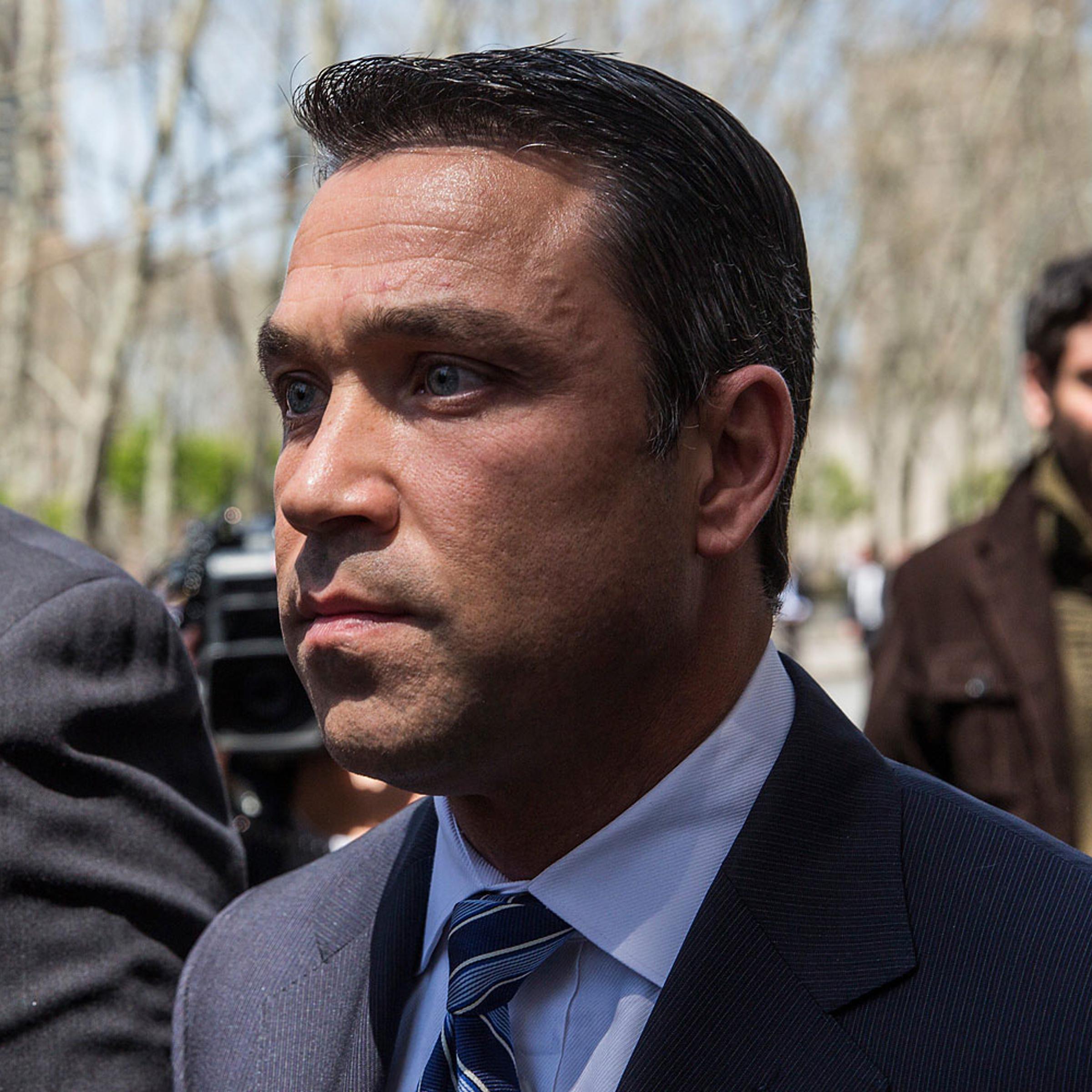 Representative Michael Grimm walks out of Brooklyn Federal Court after being indicted on 20 counts on April 28, 2014 in New York.