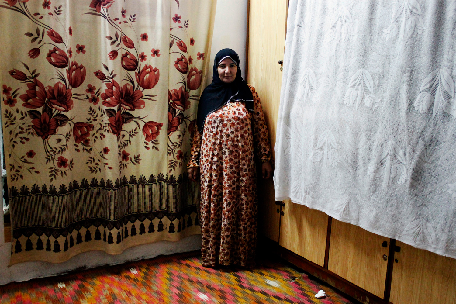 A portrait from the series, "Women." The photographer, Gona Aziz is a high school teacher.