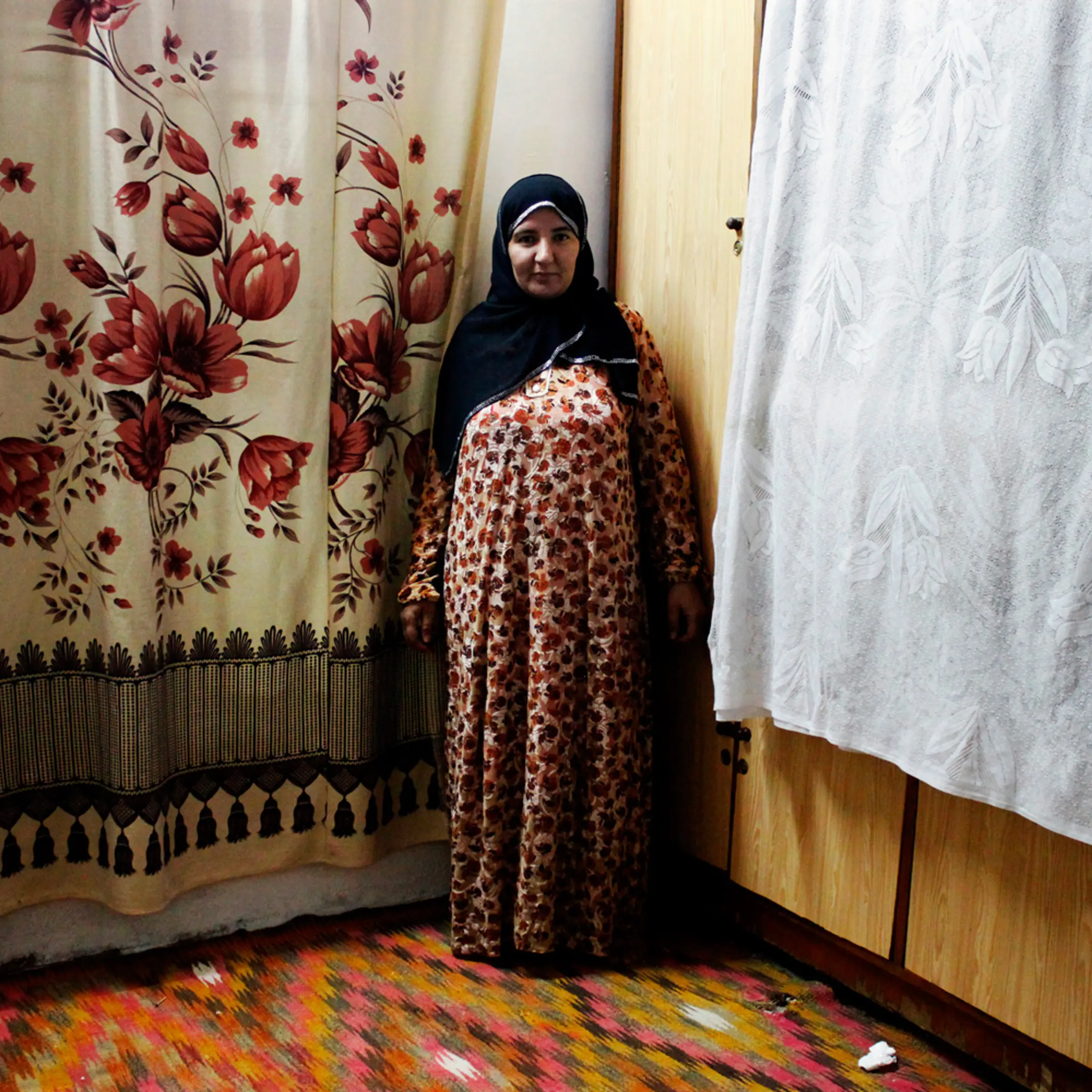 A portrait from the series, "Women." The photographer, Gona Aziz is a high school teacher.