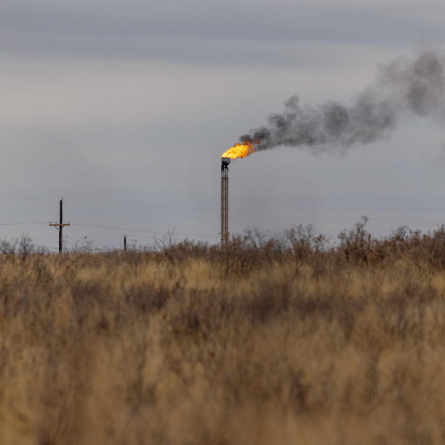 A natural gas flare stack at an oil well in Midland, Texas, U.S. on April 4, 2022.