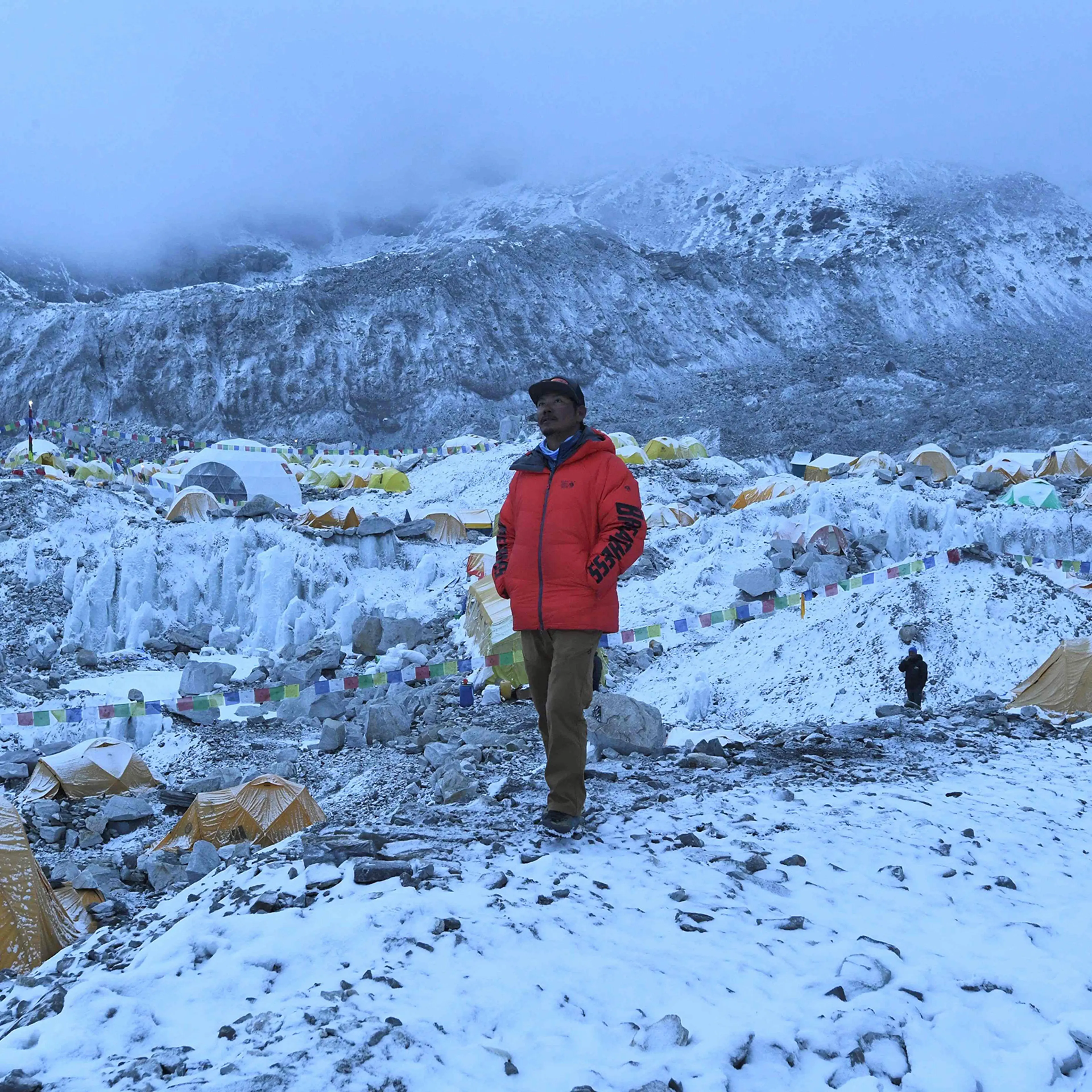 Mountaineer and expedition manager Tashi Lakpa Sherpa poses for a picture on May 1 at Everest base camp. A coronavirus outbreak on Mount Everest has seen dozens of people evacuated by helicopter from the foot of the world's highest peak, derailing Nepal'