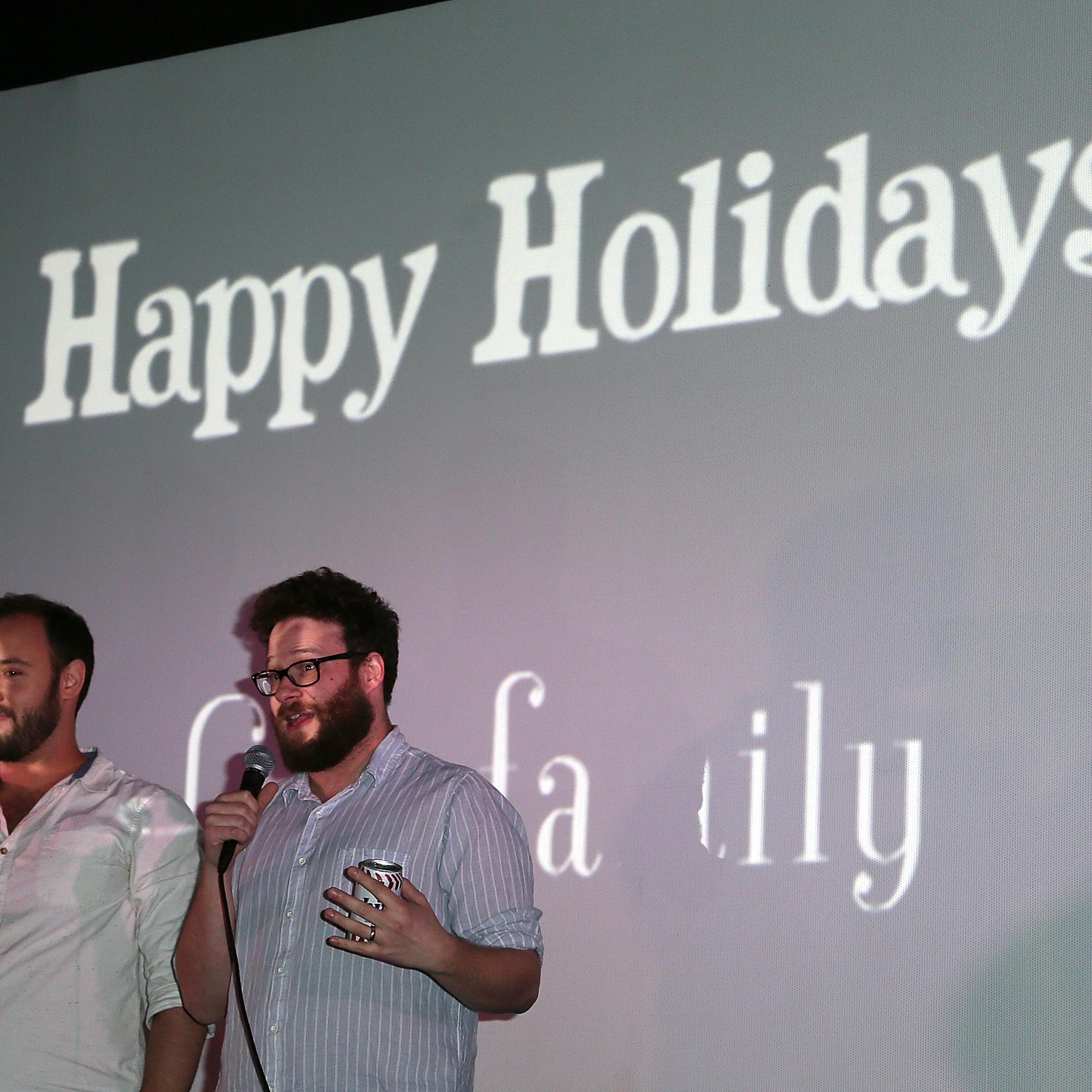 Writers/directors Evan Goldberg (L) and Seth Rogen introduce the screening of Sony Pictures' "The Interview" at Cinefamily on Dec. 25, 2014 in Los Angeles.