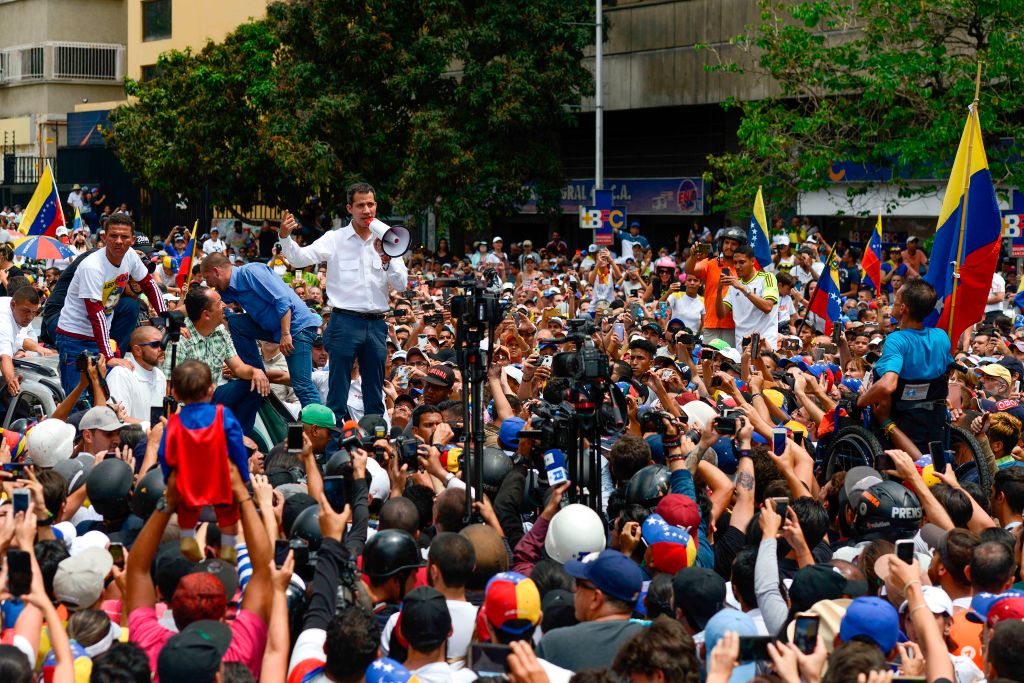 Venezuelan opposition leader and self-proclaimed acting president Juan Guaido speaks during a demo in Caracas