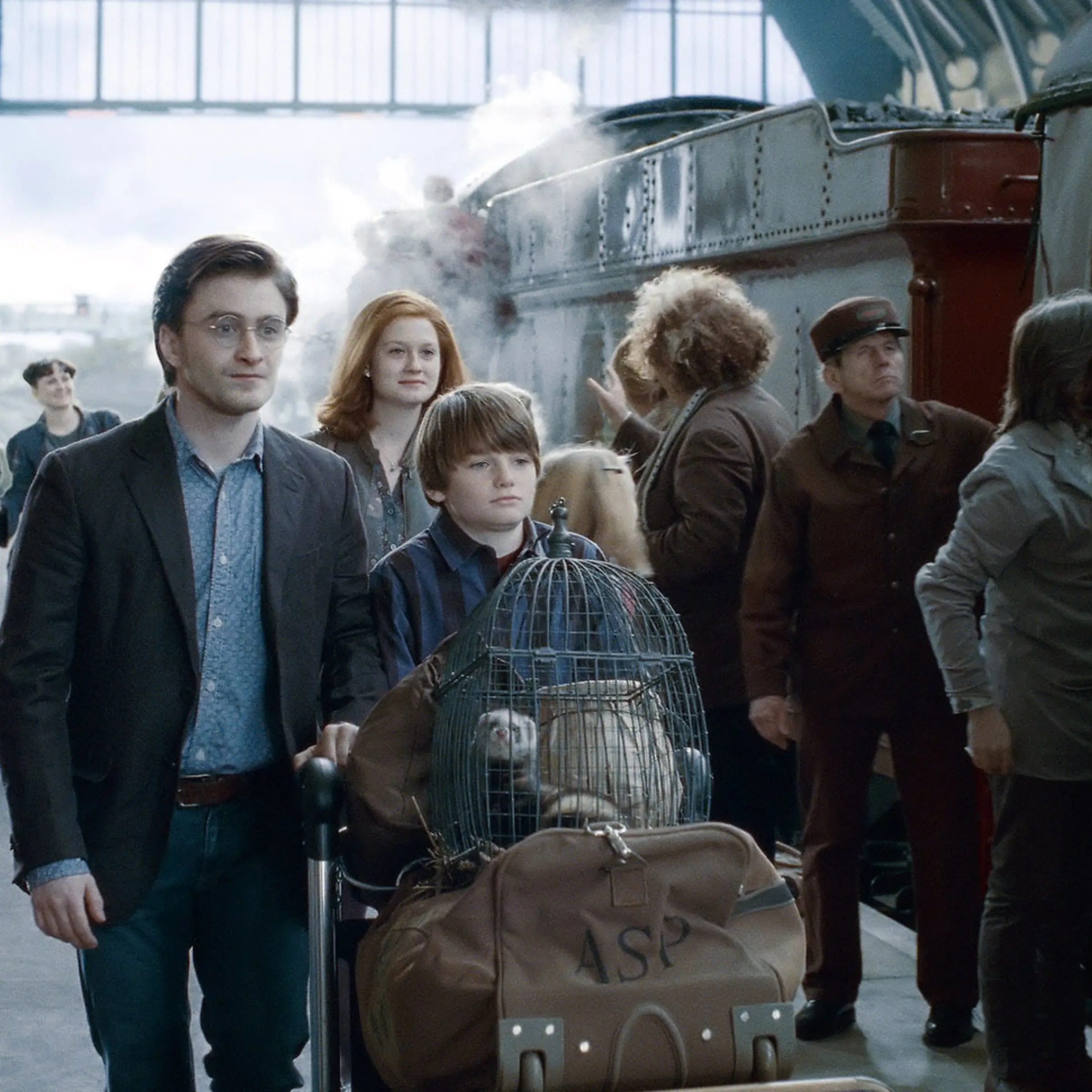 Daniel Radcliffe as Harry Potter and Arthur Bowen as Albus Severus Potter in Harry Potter and the Deathly Hallows - Part 2