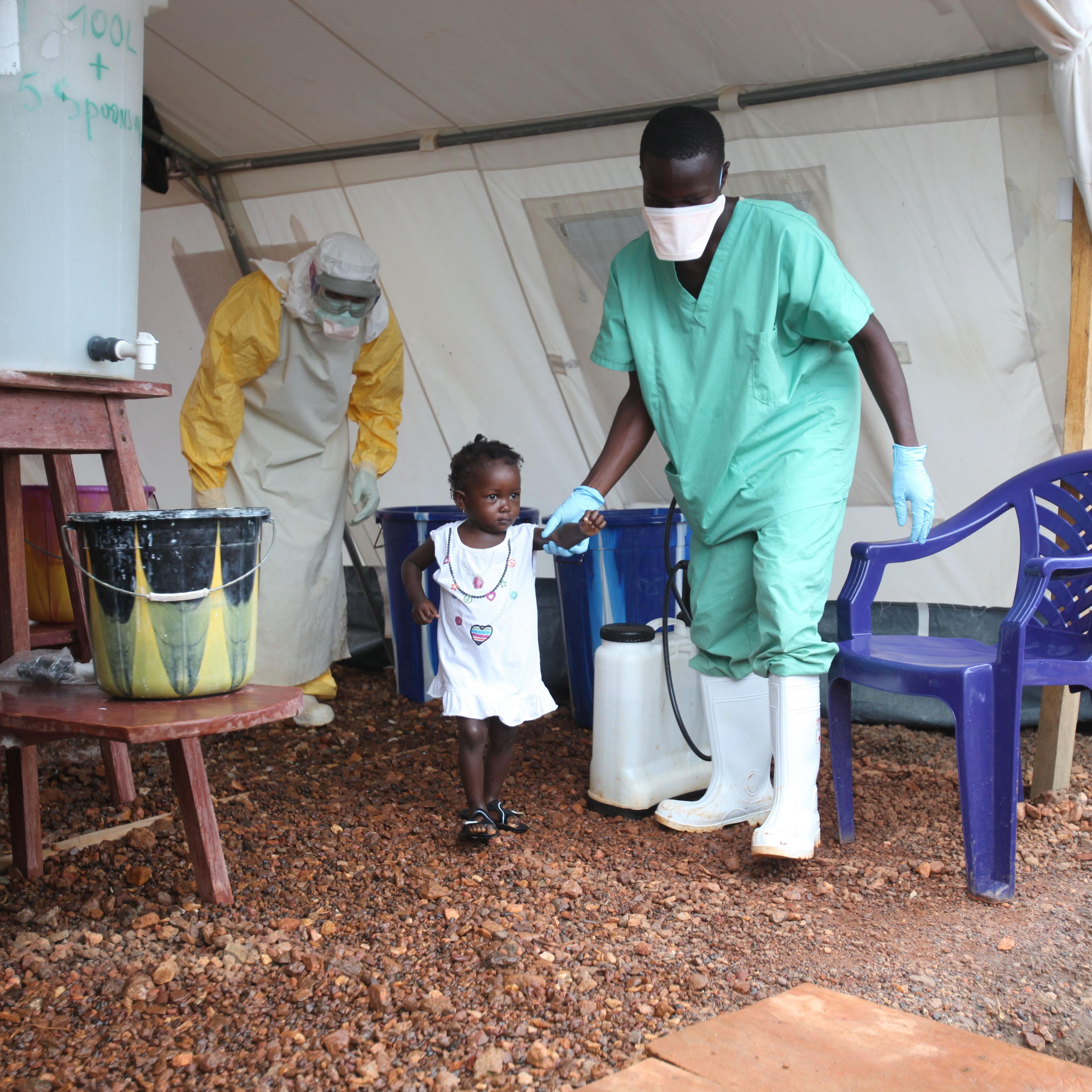 Isata, a 22-month-old, is the youngest patient to be discharged from the Ebola treatment centre in Kailahun district, Sierra Leone on Aug. 6, 2014.