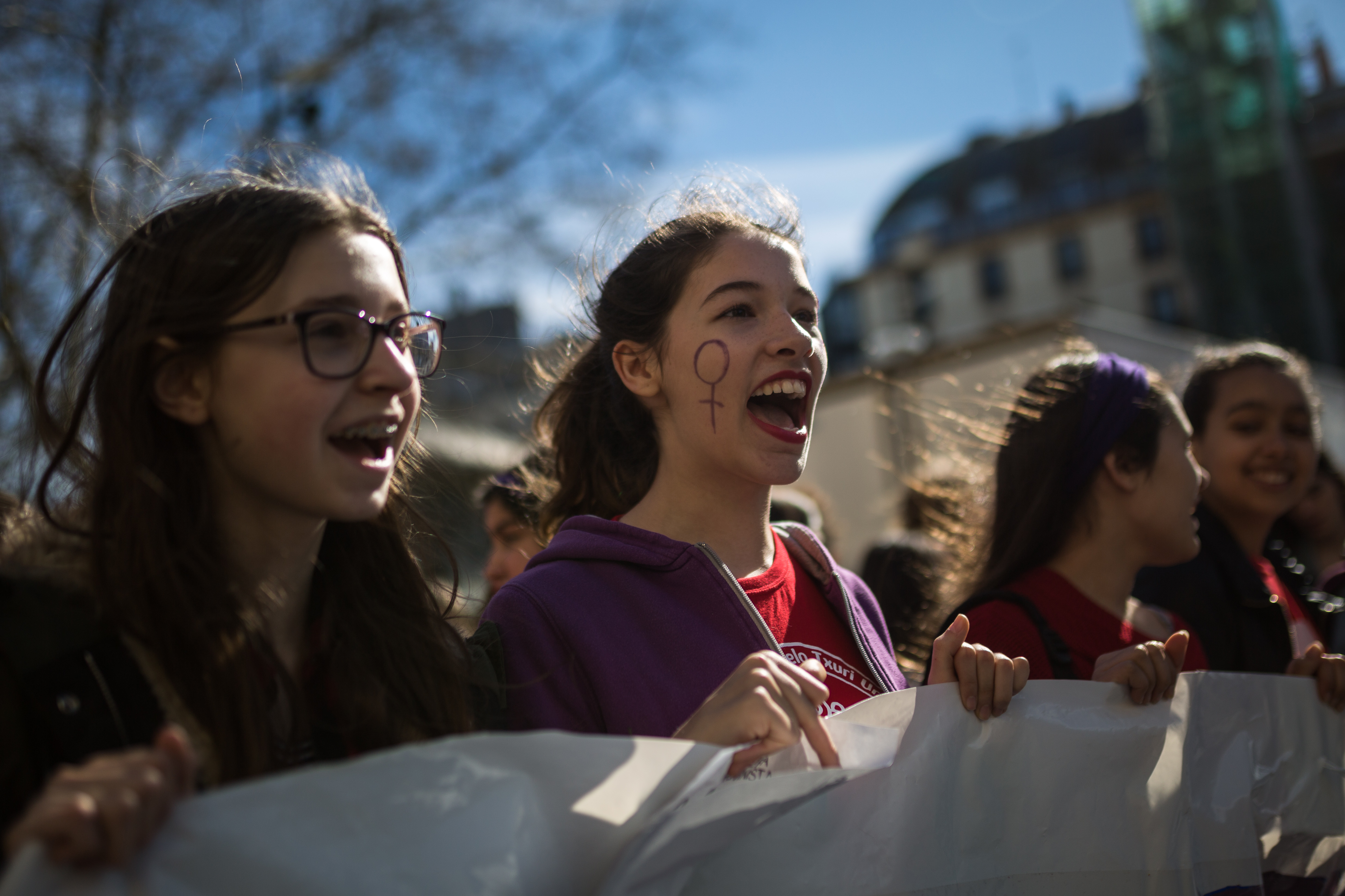 Several students carry a banner during demonstrations of the