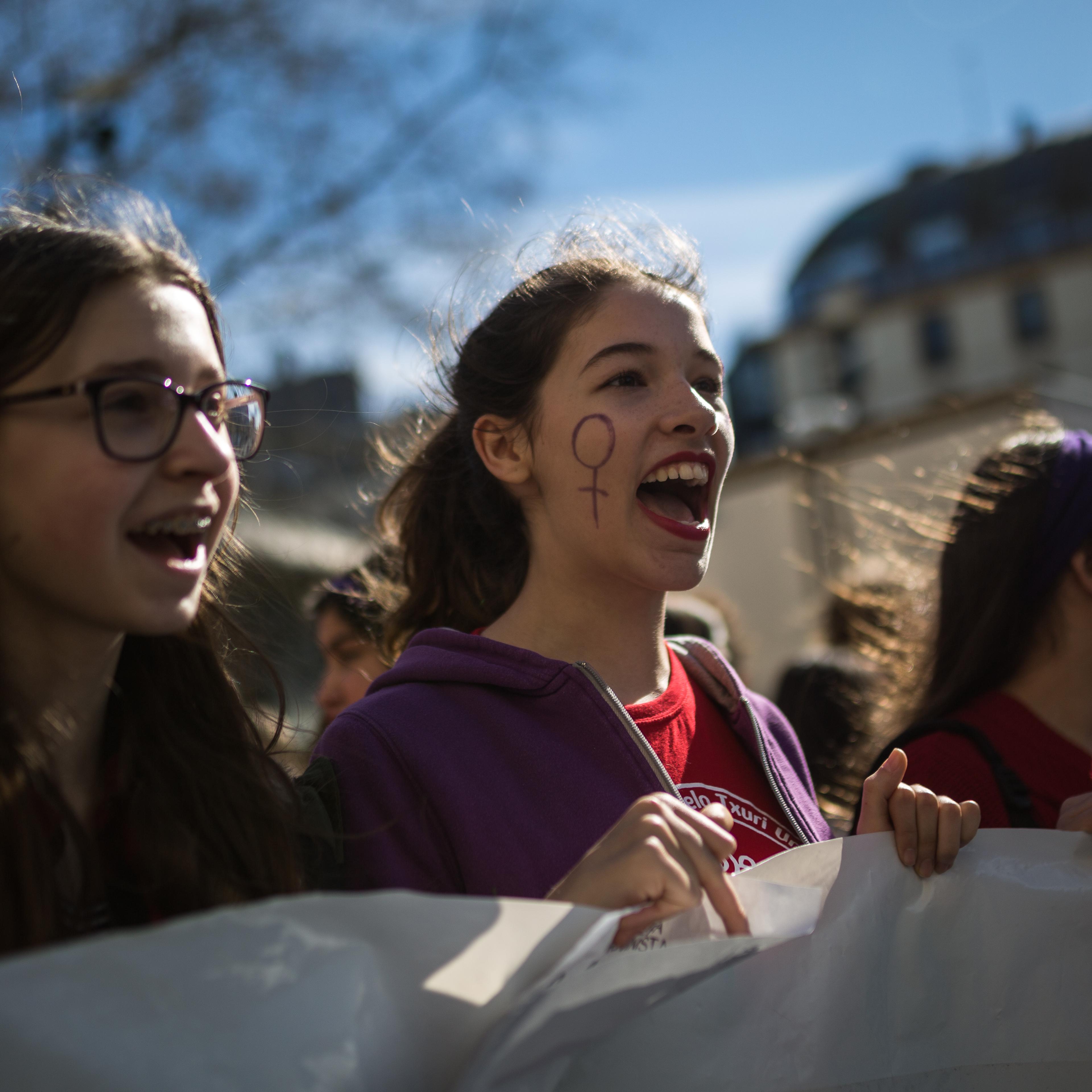 Several students carry a banner during demonstrations of the