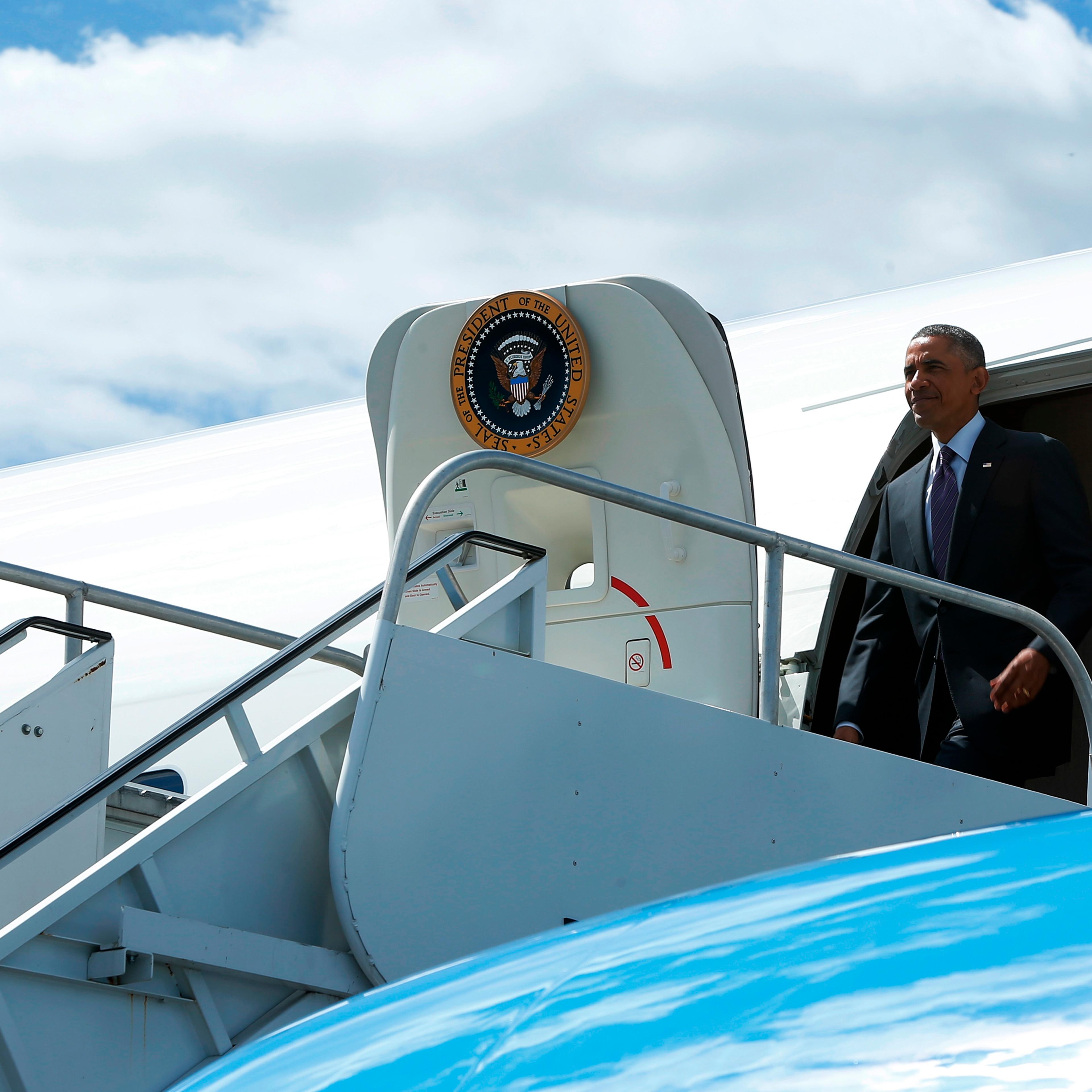 U.S. President Obama arrives onboard Air Force One at Westchester County Airport in White Plains, New York