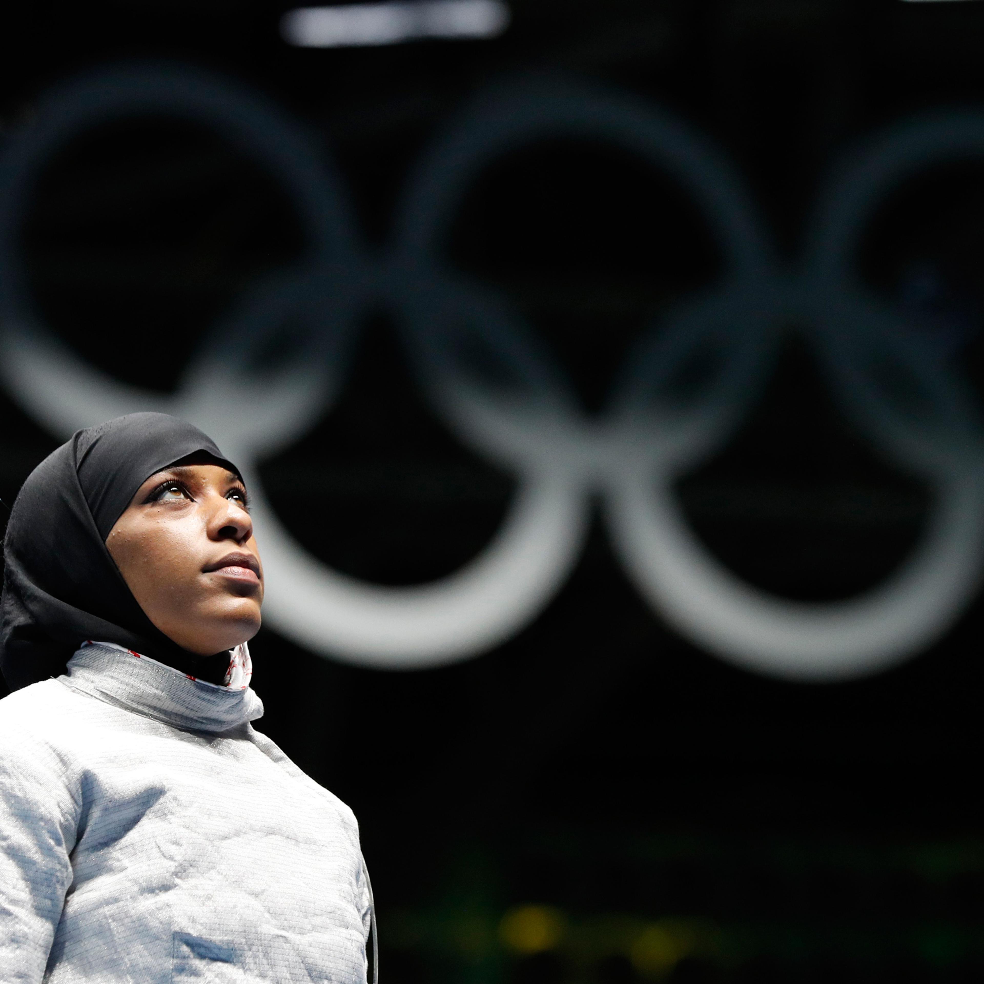 CORRECTS FIRST NAME TO IBTIHAJ FROM UBRIHAJ - Ibtihaj Muhammad, from United States, waits for match against Olena Kravatska from Ukraine, in the women's saber individual fencing event at the 2016 Summer Olympics in Rio de Janeiro, Brazil, Monday, Aug. 8,