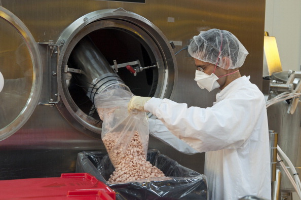 An employee works in the tablet production plant at Teva Pharmaceutical Industries Ltd.'s headquarters in Jerusalem on Sept. 19, 2011.