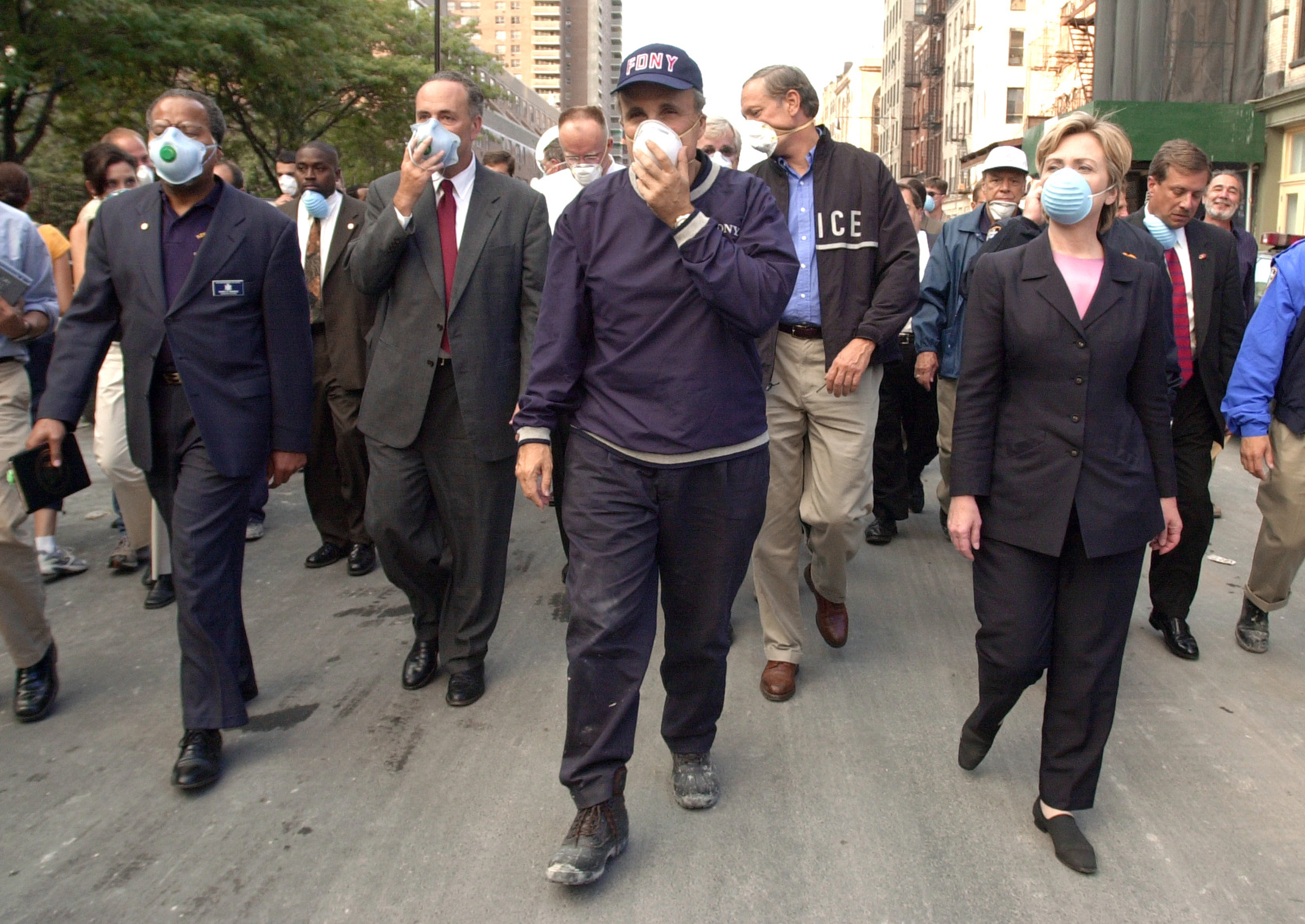 NEW YORK, NY - SEPTEMBER 12: New York City Mayor Rudolph Giuliani (C) leads US Senator Charles Schumer, R-NY (2nd L), New York Governor George Pataki (2nd R) and US Senator Hillary Rodham Clinton, D-NY (R), on a tour of the site of the World Trade Center