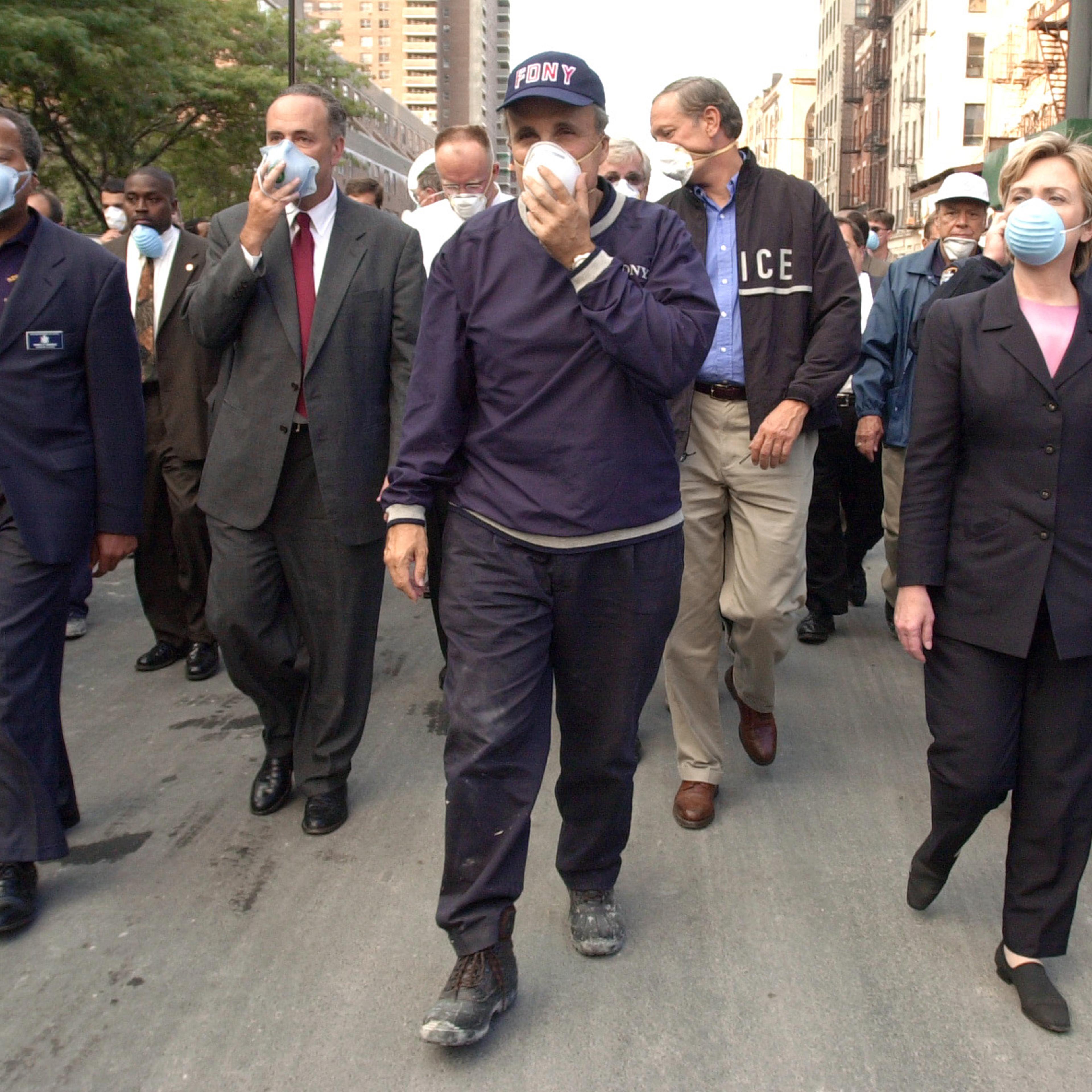 NEW YORK, NY - SEPTEMBER 12: New York City Mayor Rudolph Giuliani (C) leads US Senator Charles Schumer, R-NY (2nd L), New York Governor George Pataki (2nd R) and US Senator Hillary Rodham Clinton, D-NY (R), on a tour of the site of the World Trade Center