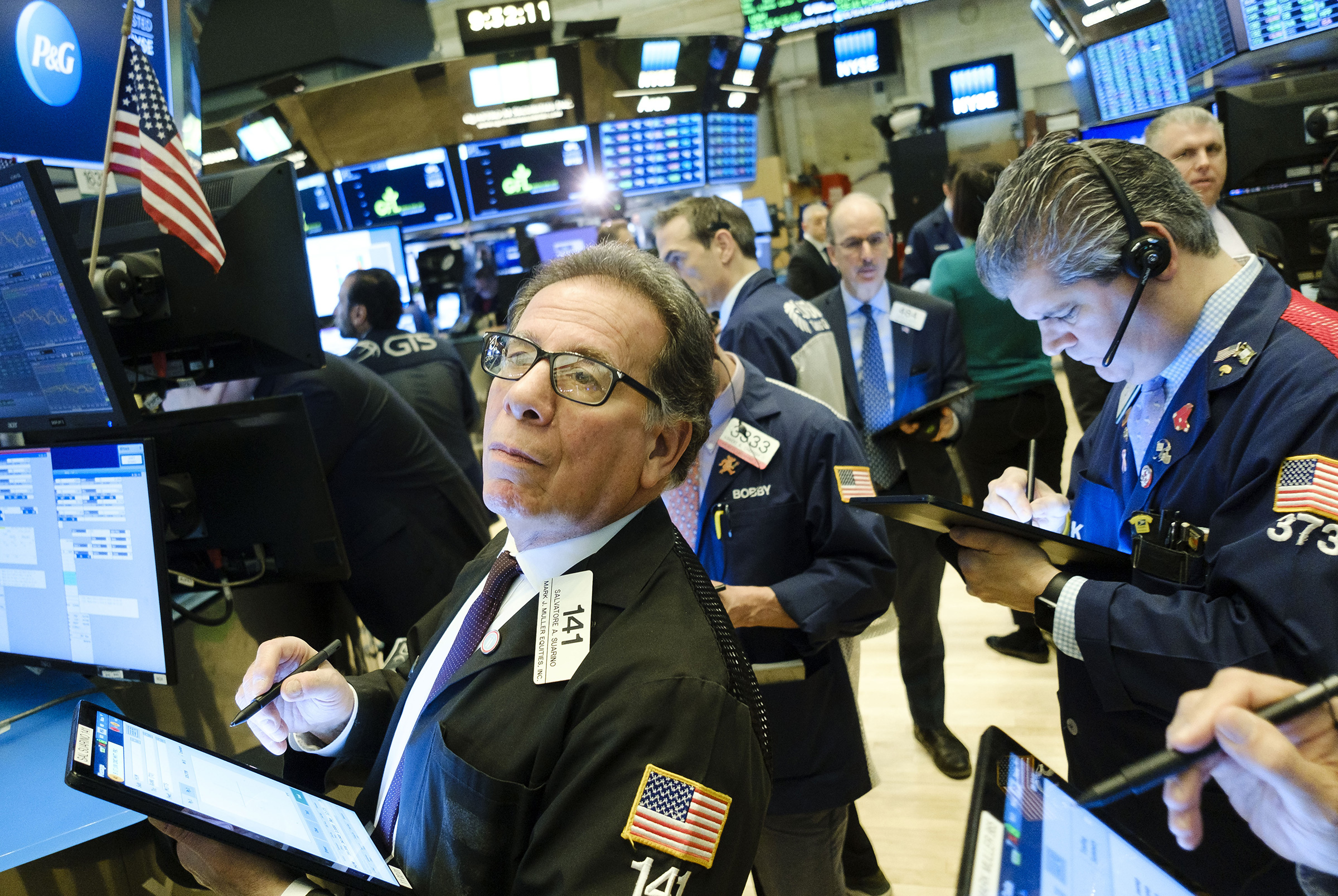 Traders work on the floor of the New York Stock Exchange on Mar. 4
