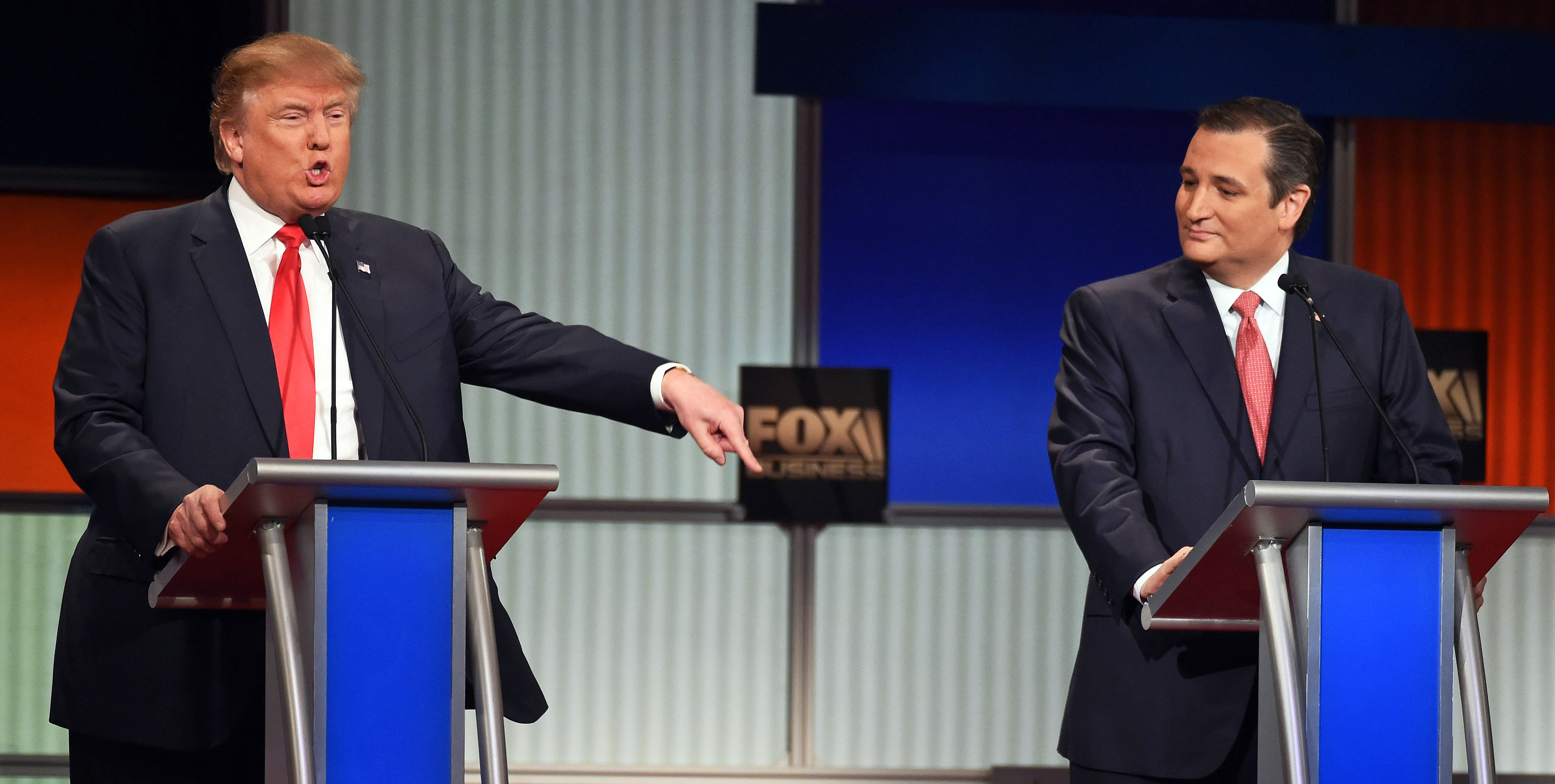 Republican presidential candidate, businessman Donald Trump speaks as Republican presidential candidate, Sen. Ted Cruz, R-Texas, looks on during the Republican presidential debate at the North Charleston Coliseum, Thursday, Jan. 14, 2016, in North Charle