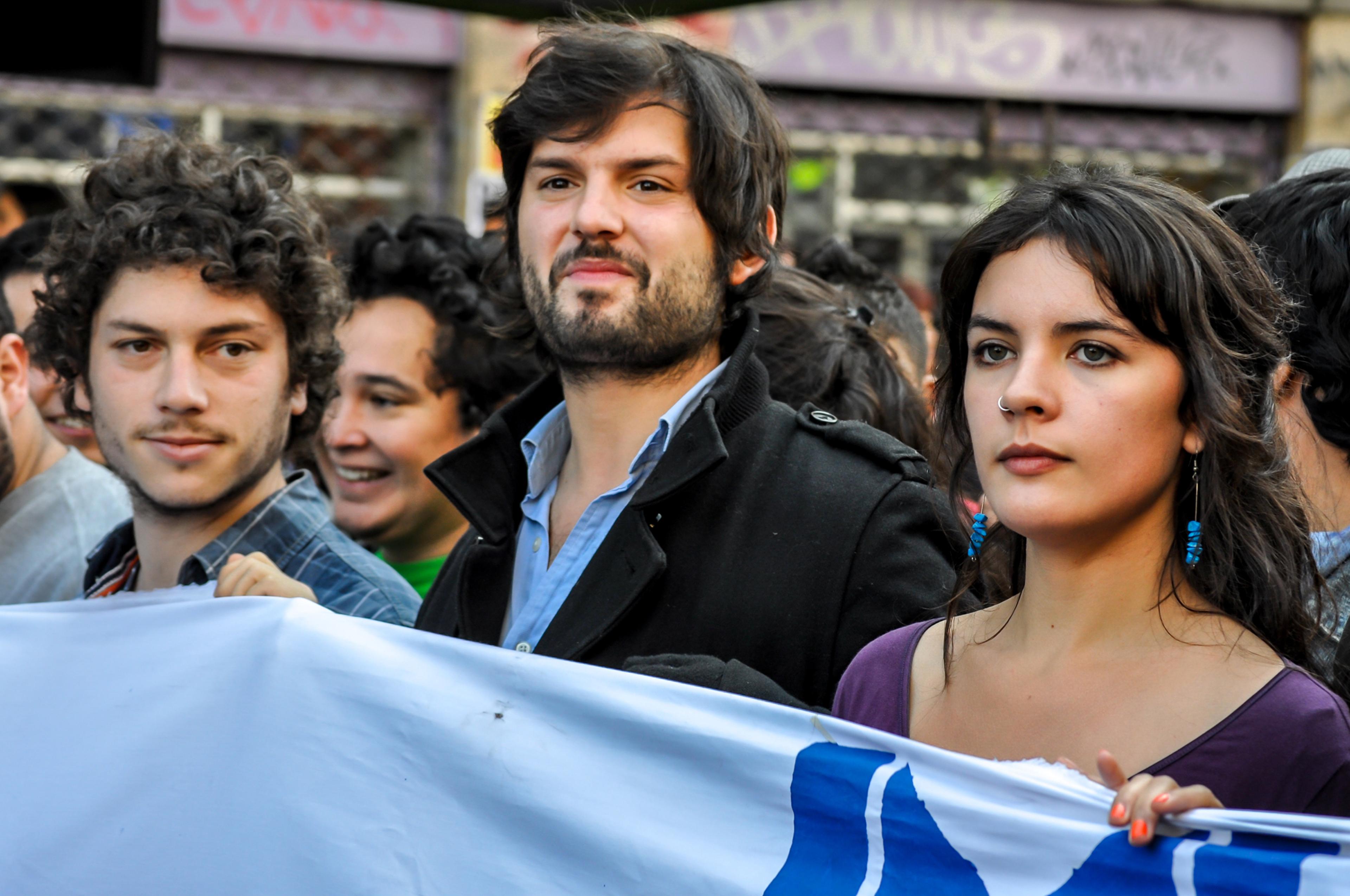 Boric in 2012 with student leaders, including future official spokesperson Camila Vallejo, right