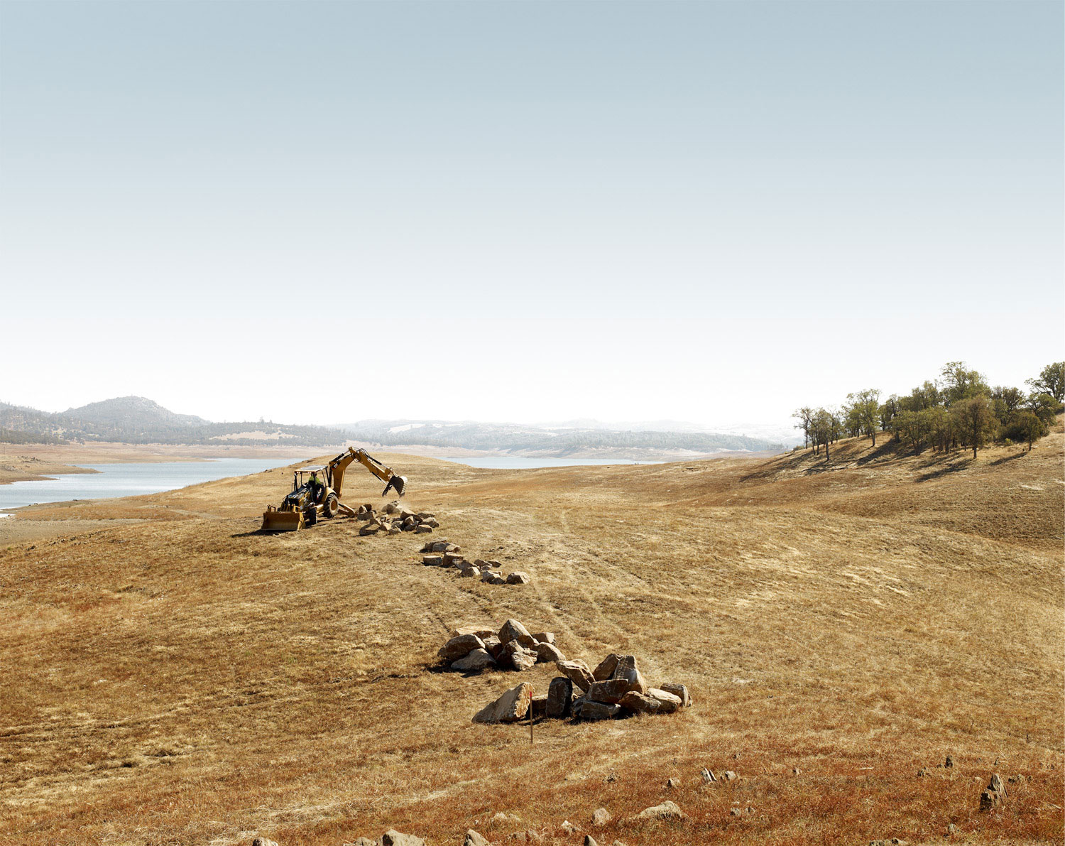 <B>New Hogan Lake, Valley Springs, California</B><br><br>

Place boulders in Wrinkle Cove and Whiskey Creek 
Recreation Areas. Boulders will be used to prevent 
illegal off-road travel during low lake levels and 
prevent environmental degradation.<br><br>

Amount funded by Recovery Act: $125,000.00
