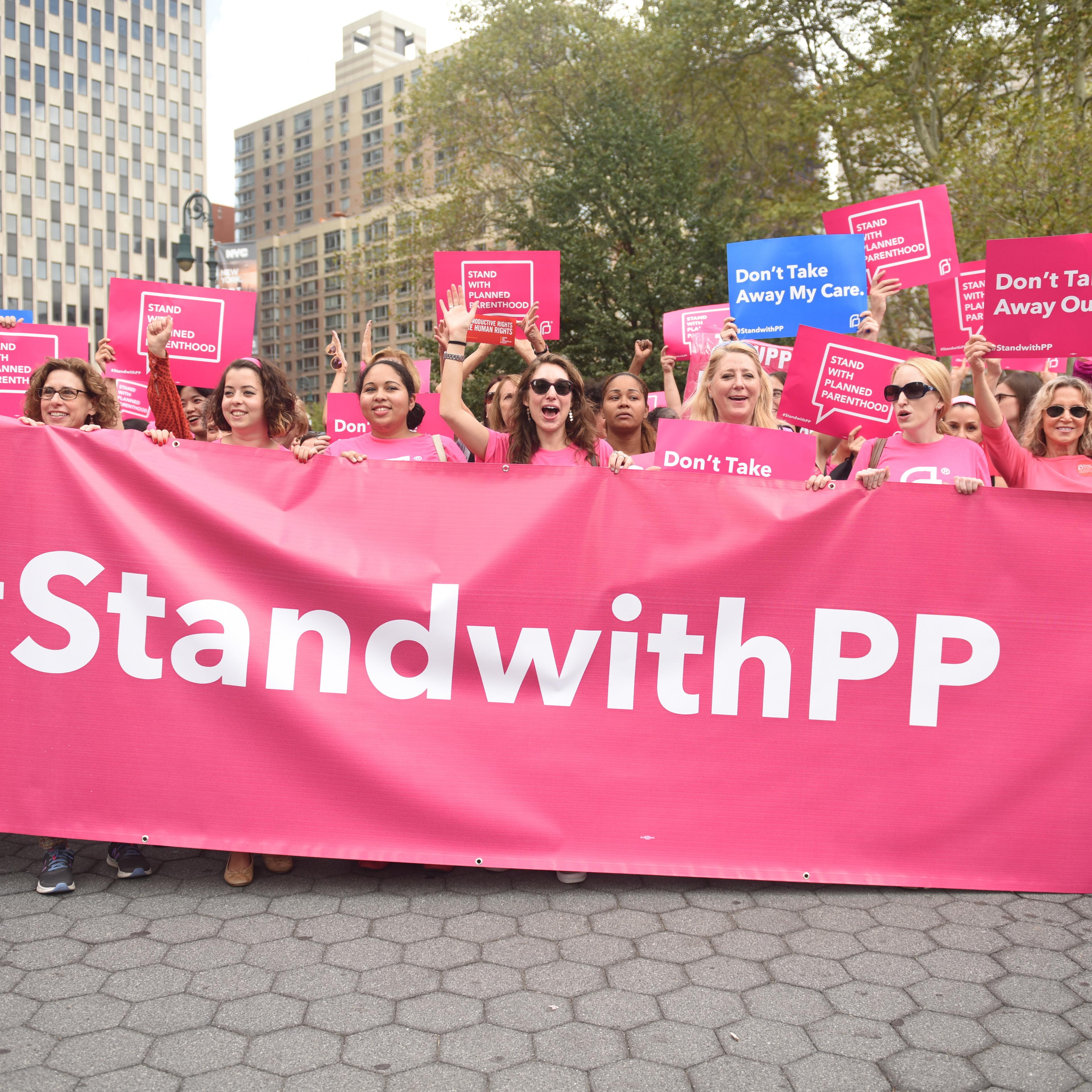 Activists hold Planned Parenthood banner in Foley Square.