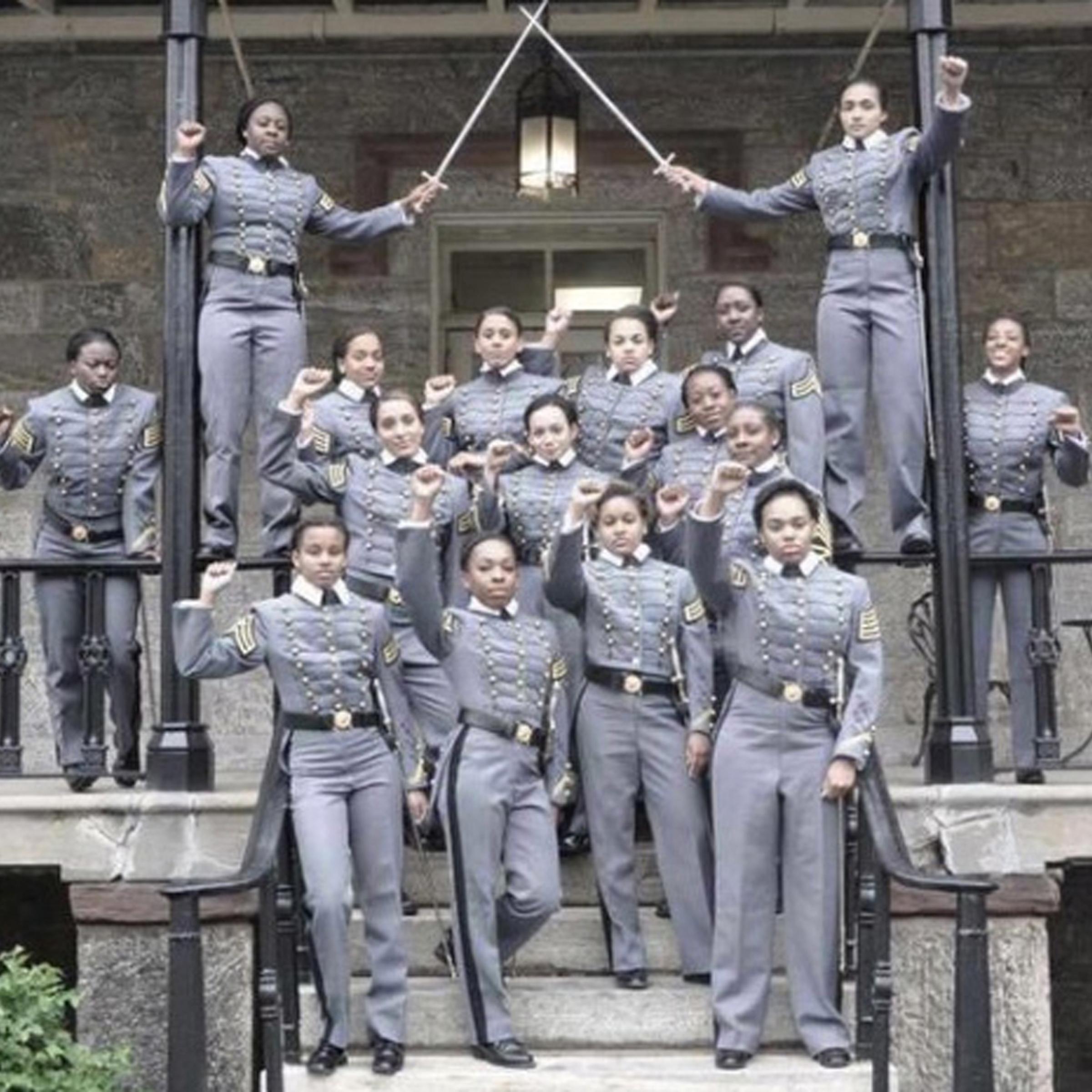 This undated image obtained from Twitter on Saturday, May 7, 2016 shows 16 black, female cadets in uniform with their fists raised while posing for a photograph at the United States Military Academy at West Point, N.Y. The U.S. Military Academy has launc