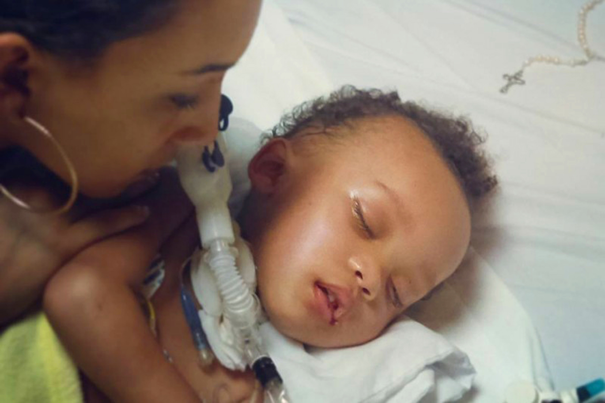 This undated photo provided by Jonee Fonseca shows her with her 2-year-old son Israel Stinson while on life support in a California hospital. The brain-dead toddler died Thursday, Aug. 25, 2016, soon after being taken off life support under a judge's ord
