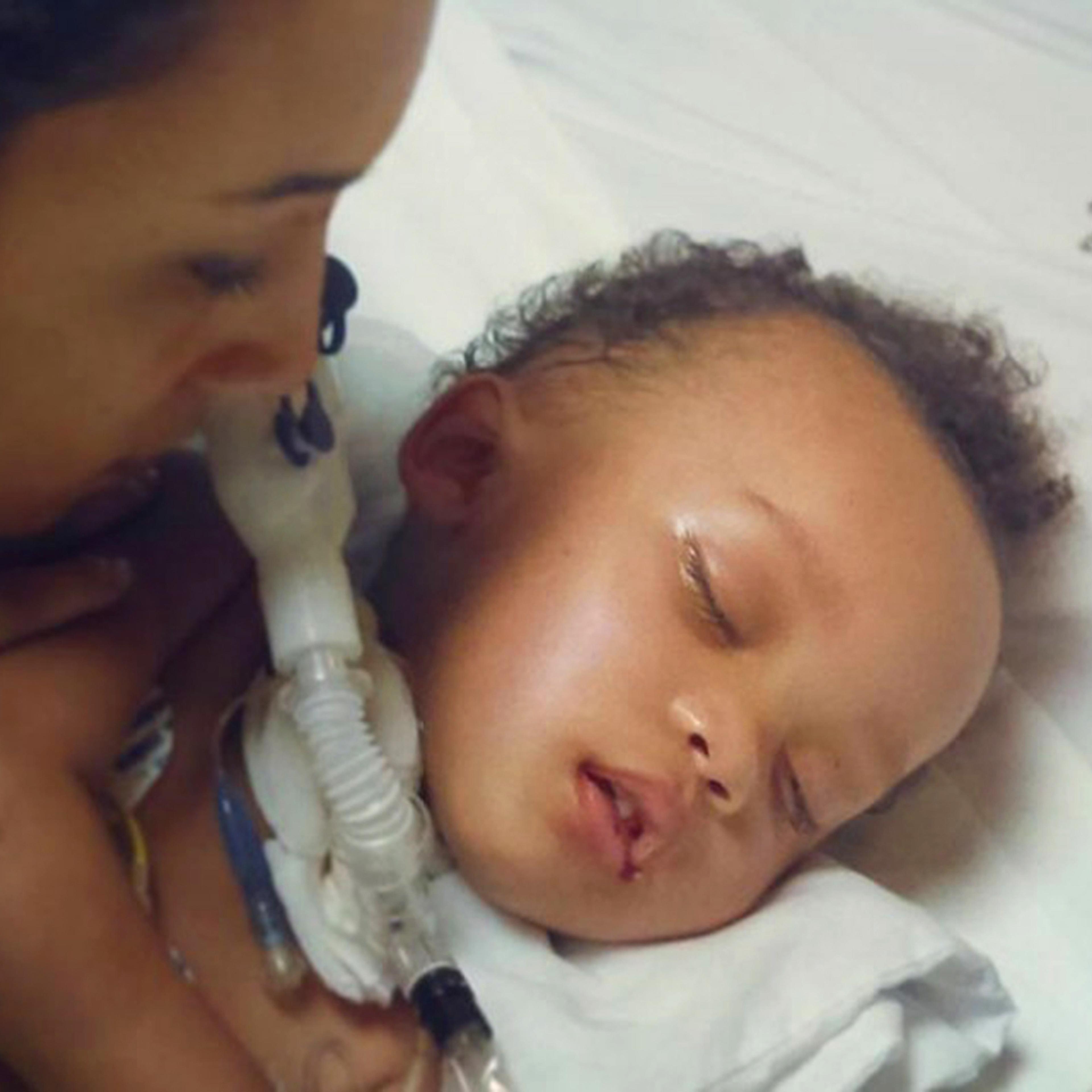This undated photo provided by Jonee Fonseca shows her with her 2-year-old son Israel Stinson while on life support in a California hospital. The brain-dead toddler died Thursday, Aug. 25, 2016, soon after being taken off life support under a judge's ord